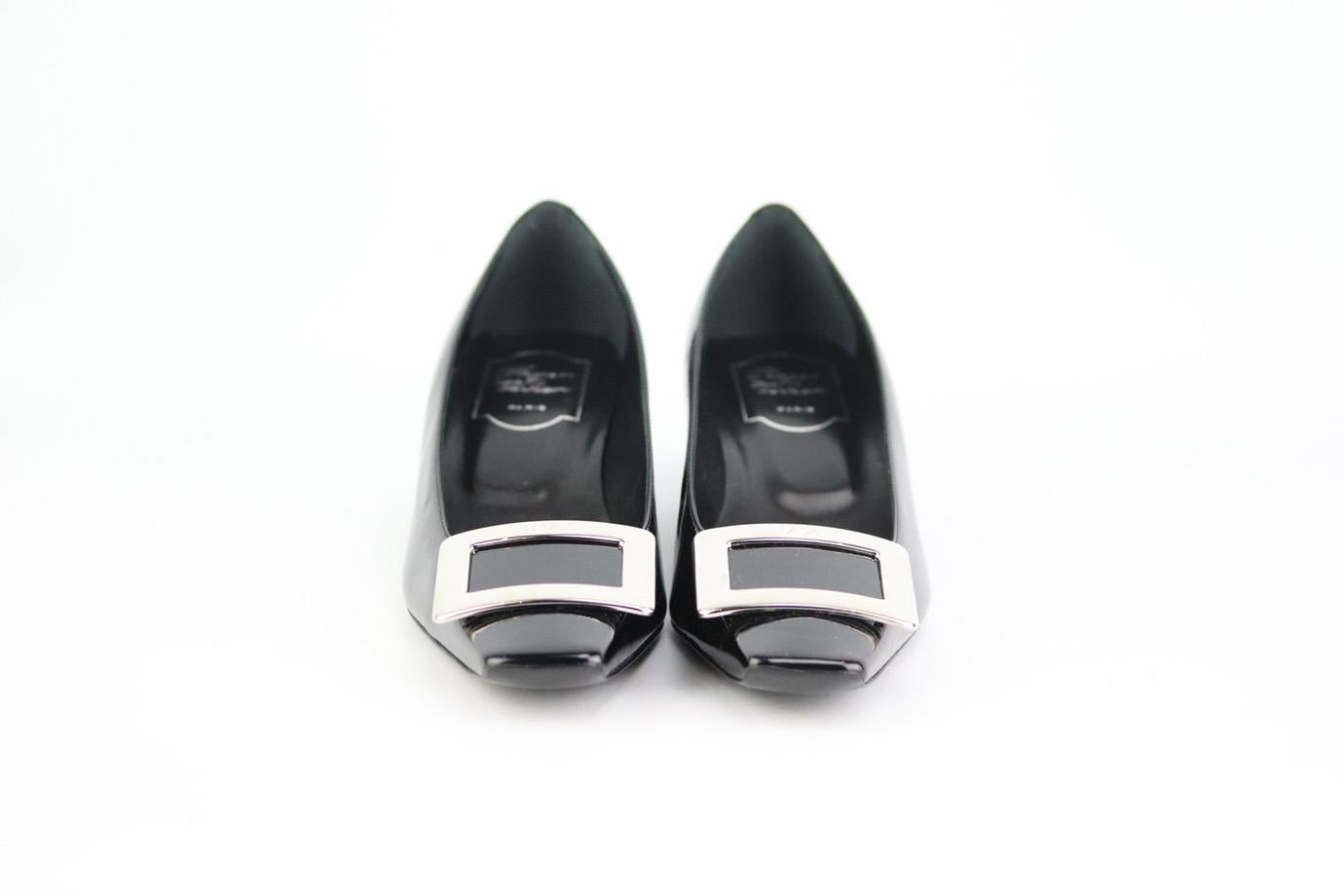 These pumps by Roger Vivier are an elegant re-creation of the founder's original 1965 design, they're made from black patent-leather and embellished with a silver signature buckle that tops the sharp square toe. Heel measures approximately 38 mm/