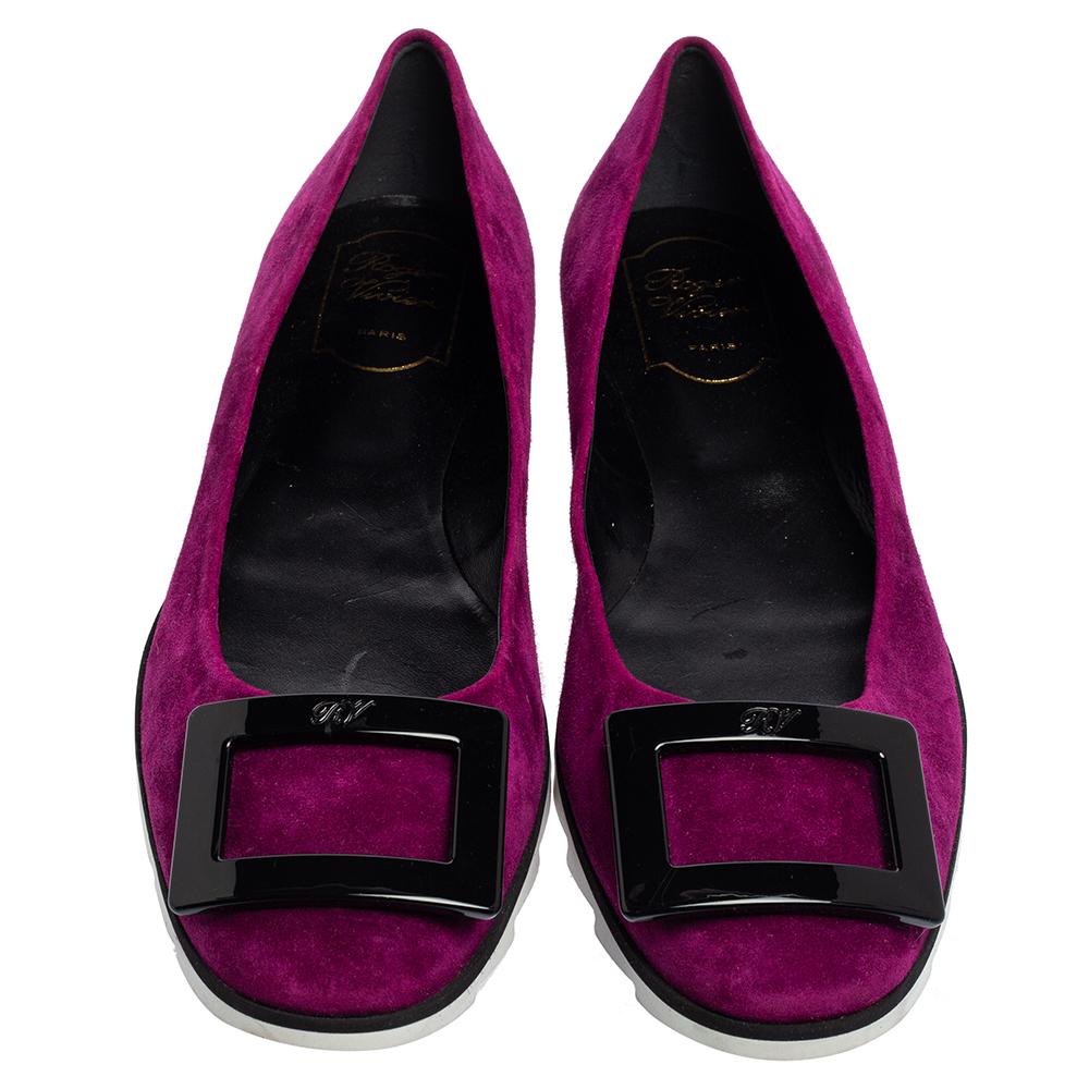 These ballet flats from Roger Vivier are crafted from suede and feature round toes with buckle-embellished vamps. They are added with comfortable leather-lined insoles and rubber soles.

Includes: Original Dustbag
