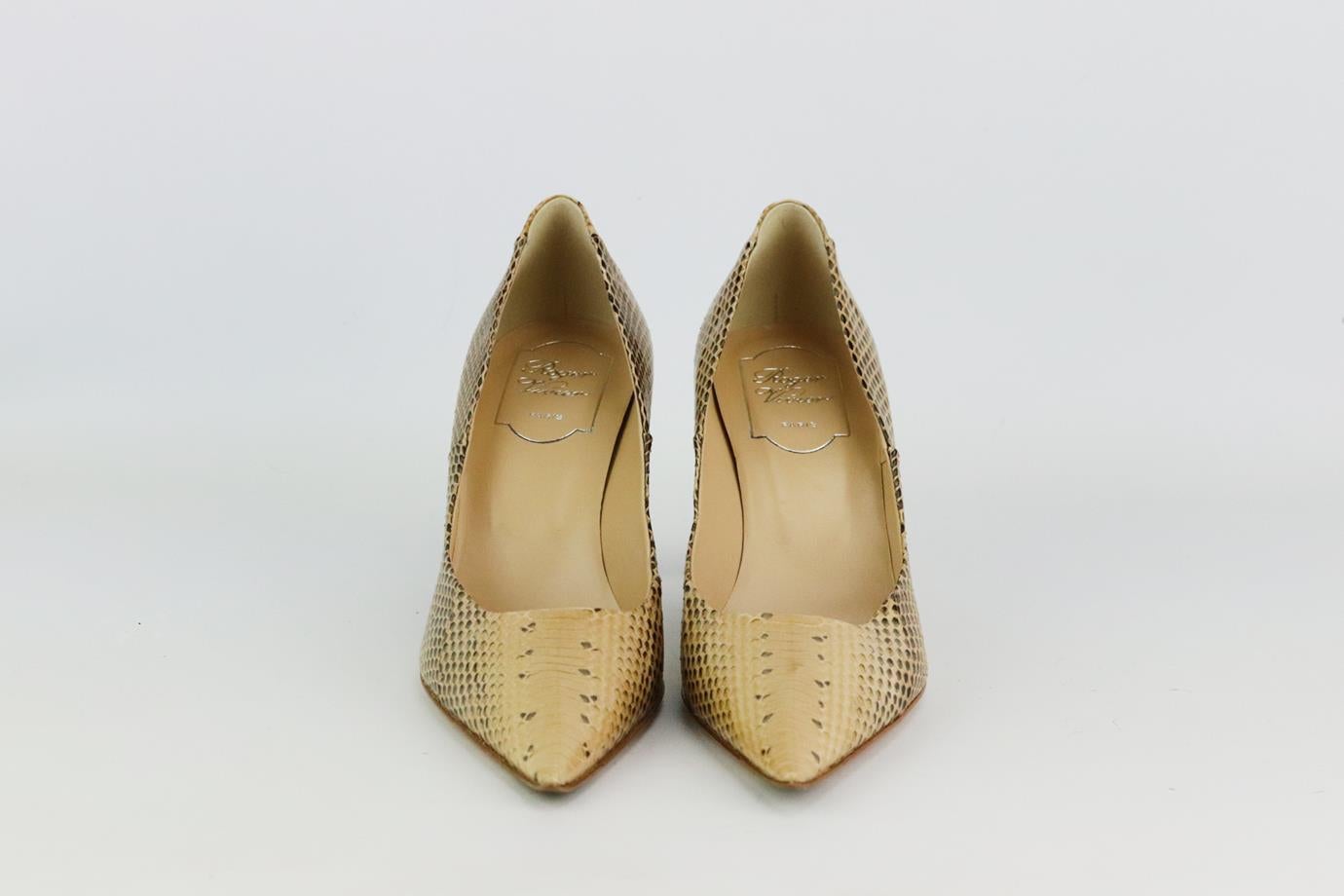 These pumps by Roger Vivier are a classic style that will never date, made in Italy from beige and black python, they have sharp pointed toes and comfortable 63 mm heels to take you from morning meetings to dinner with friends. Heel measures