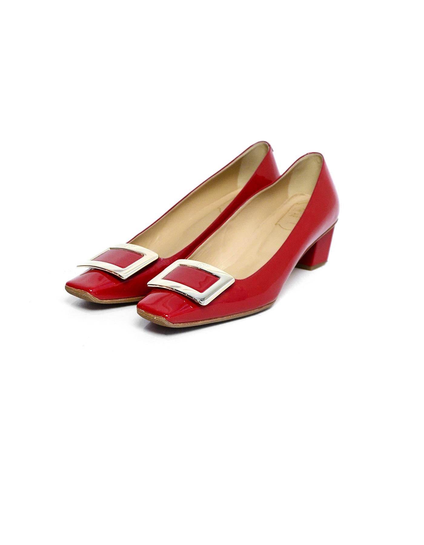 Roger Vivier Red Patent Belle Vivier Pumps w/ Buckle sz 39 rt $725

Made In: Italy
Color: Red
Hardware: Goldtone hardware
Materials: Patent leather
Closure/Opening: Slide on
Overall Condition: Very good pre-owned condition, with added insole and