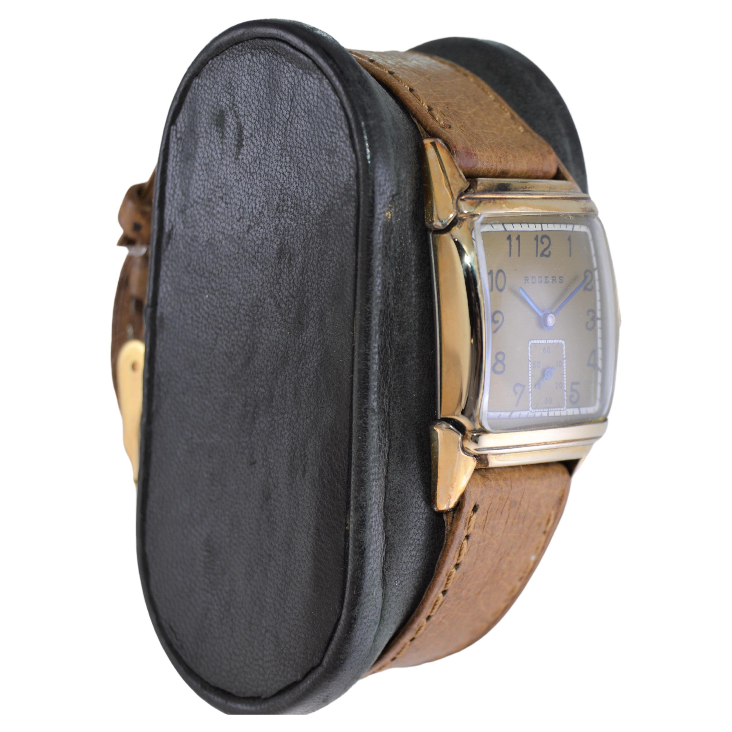 FACTORY / HOUSE: A. Shield / Rogers Watch Company
STYLE / REFERENCE: Art Deco
METAL / MATERIAL: Yellow Gold Filled
CIRCA / YEAR: 1940's
DIMENSIONS / SIZE: Length 35mm X Width 22mm
MOVEMENT / CALIBER: Manual Winding / 17 Jewels 
DIAL / HANDS: