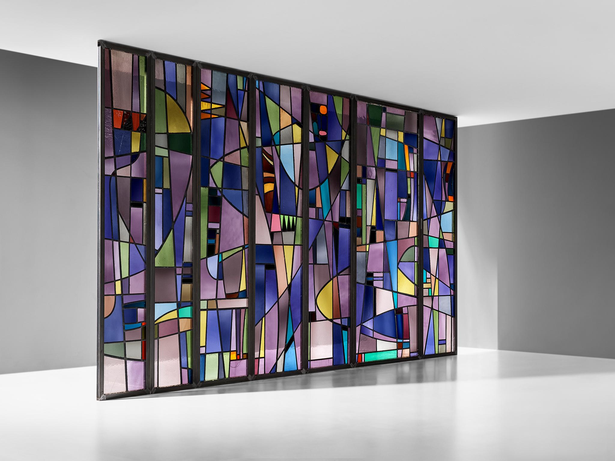 Rogier Vandeweghe, stained glass panels, room divider, Belgium, 1955-1956

Distinctive stained glass panels by Belgian artist Rogier Vandeweghe commissioned by an abbey located in Brugge and were intended for the school. This piece is very