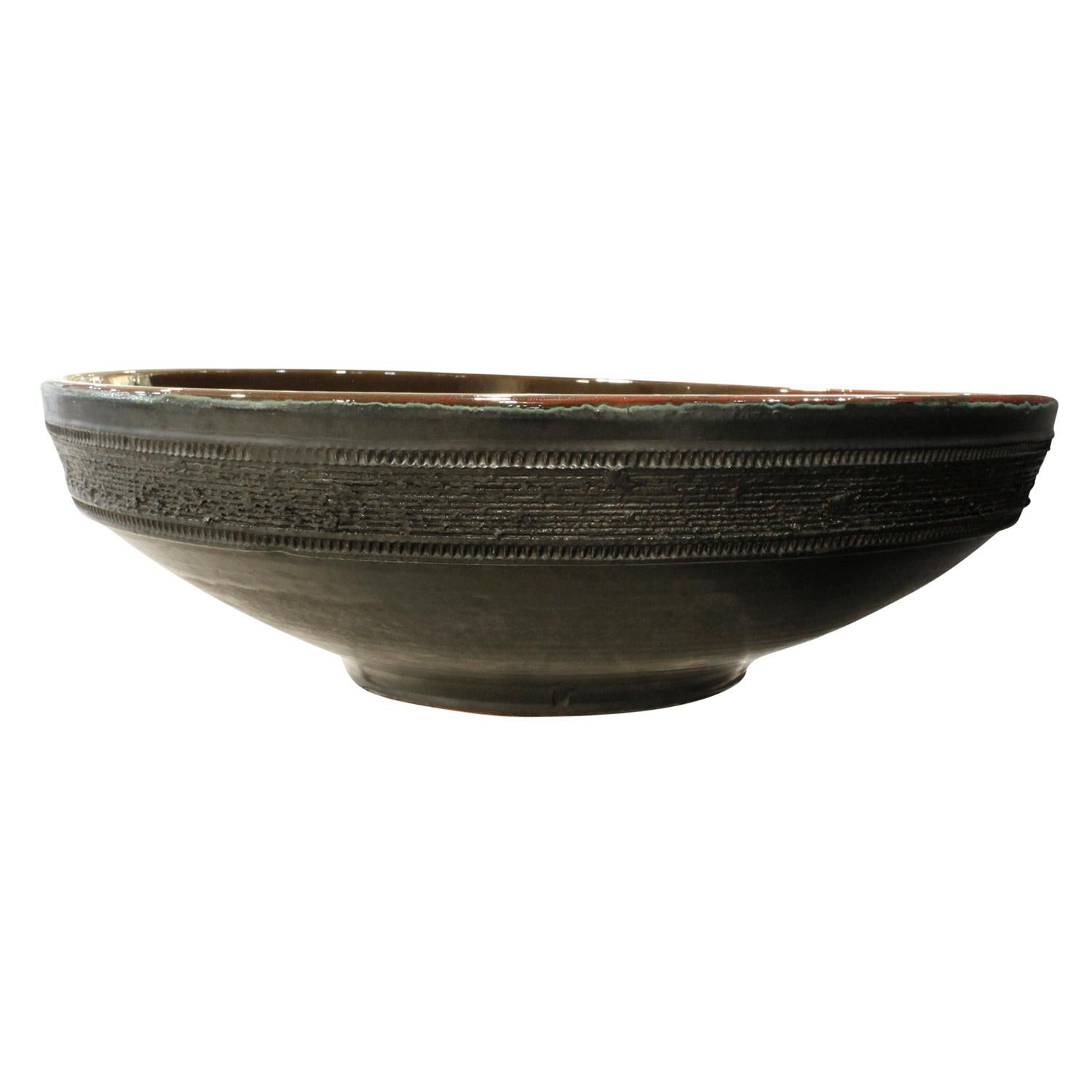 red pottery bowl