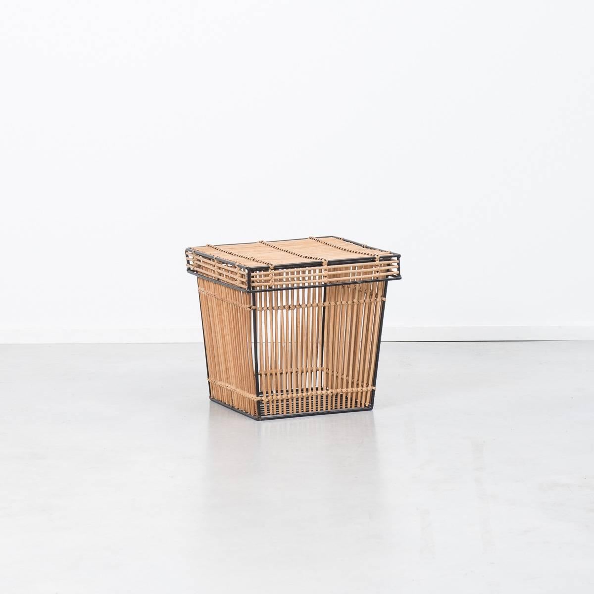 This lovely wicker and steel basket by Rohé Noordwolde has a tapered box and squared lid. It would look great with magazines in it or even a plant. It’s simple construction and shape made it a classic Dutch household accessory of at the time. Rohé