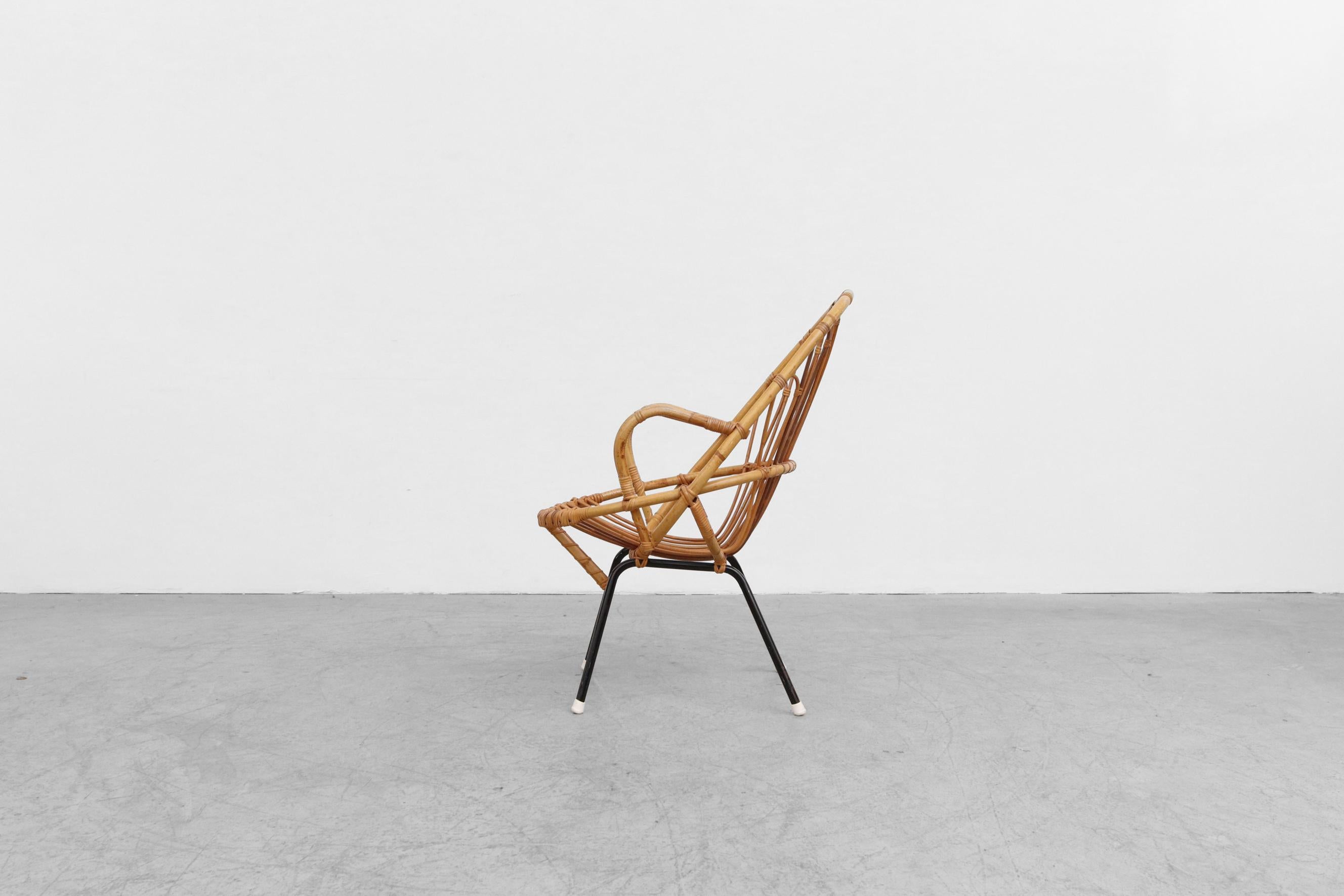 Mid-Century Modern Rohe Noordwolde Bamboo Armchair with Decorative Back and Black Legs For Sale