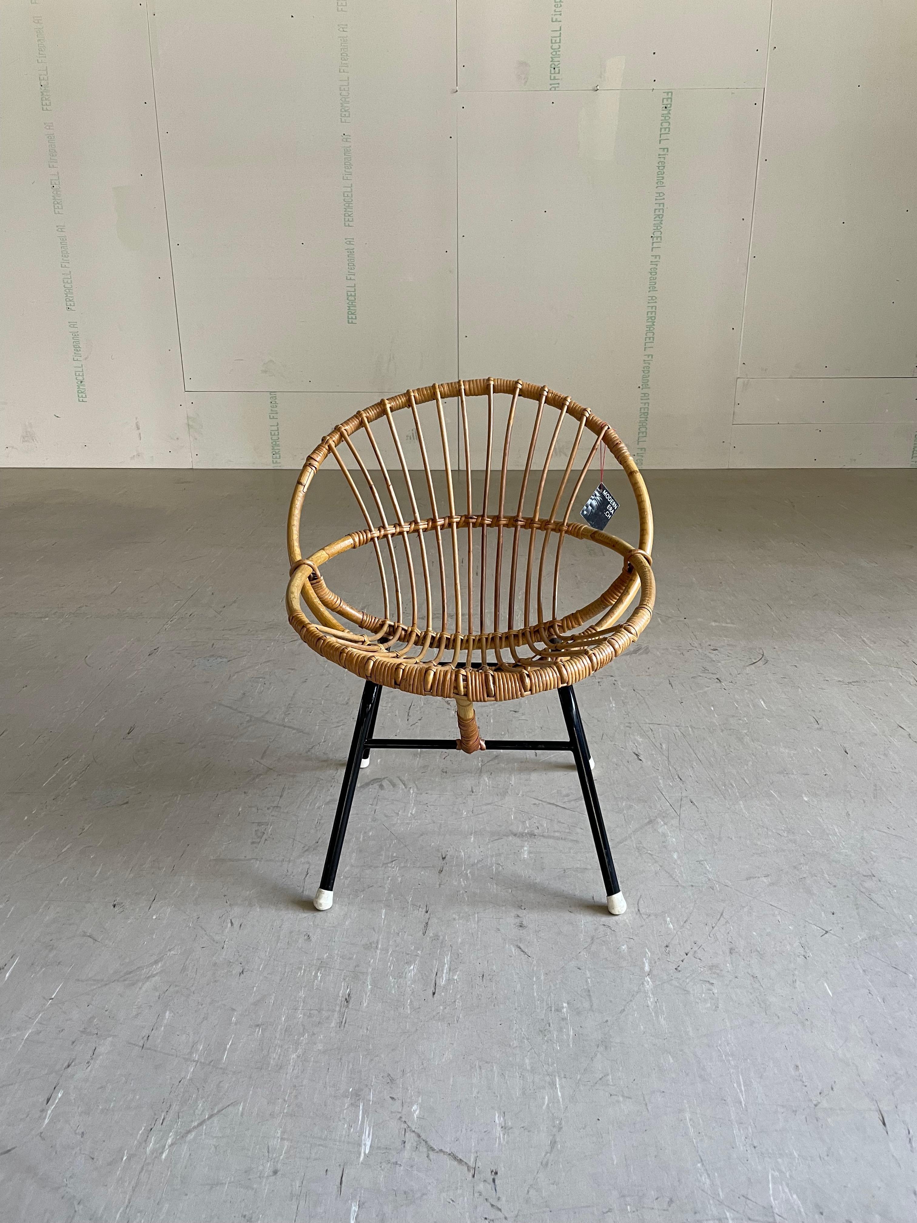 Rohé Noordwolde ‘Rattan Chair’ designed in 1958. Tubular enameled metal base with hooped bamboo and rattan seat.  In original condition with very little sign of wear.