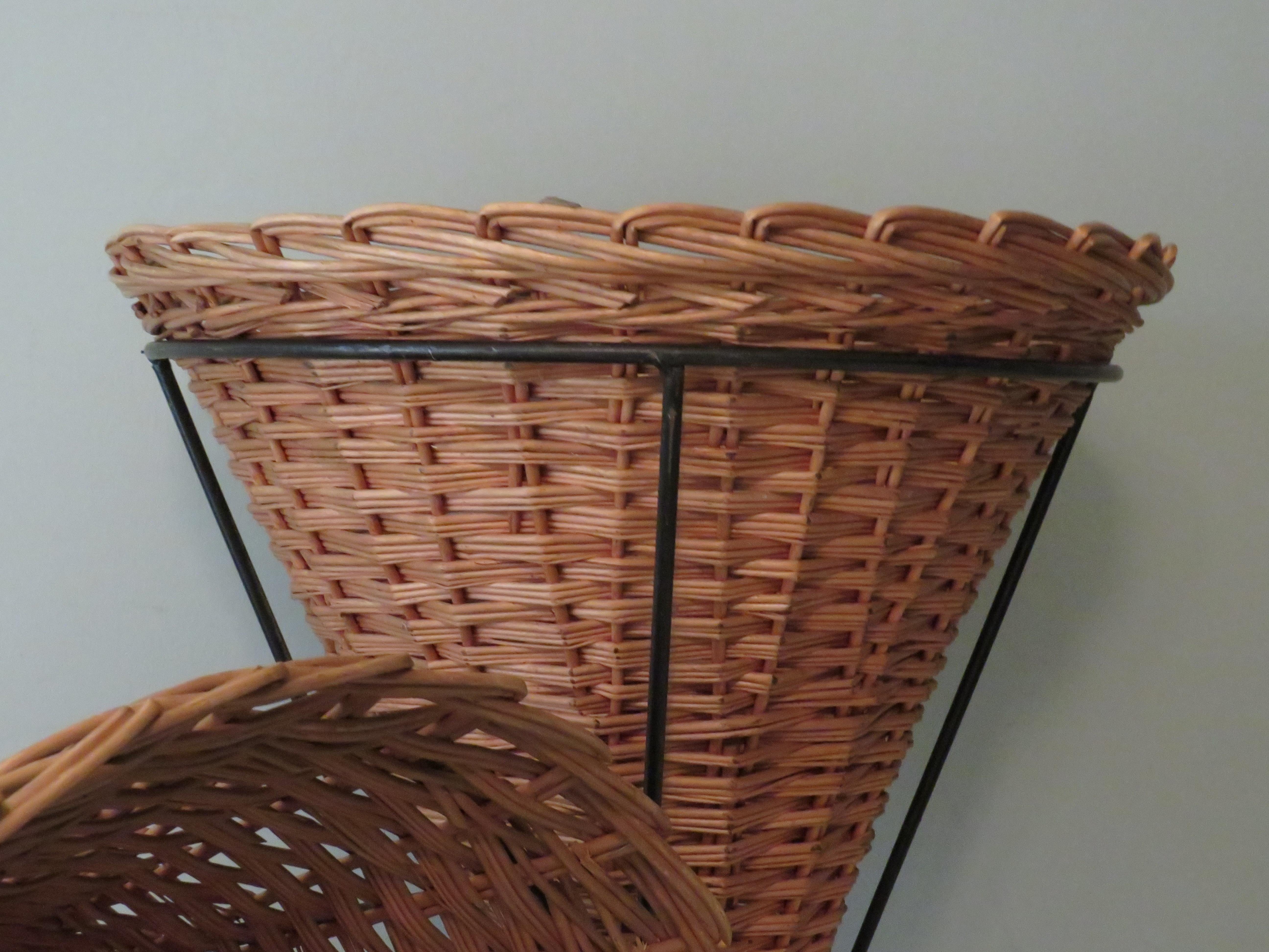 Dutch Rohé & Noordwolde, set of 2 wicker display baskets in metal base.