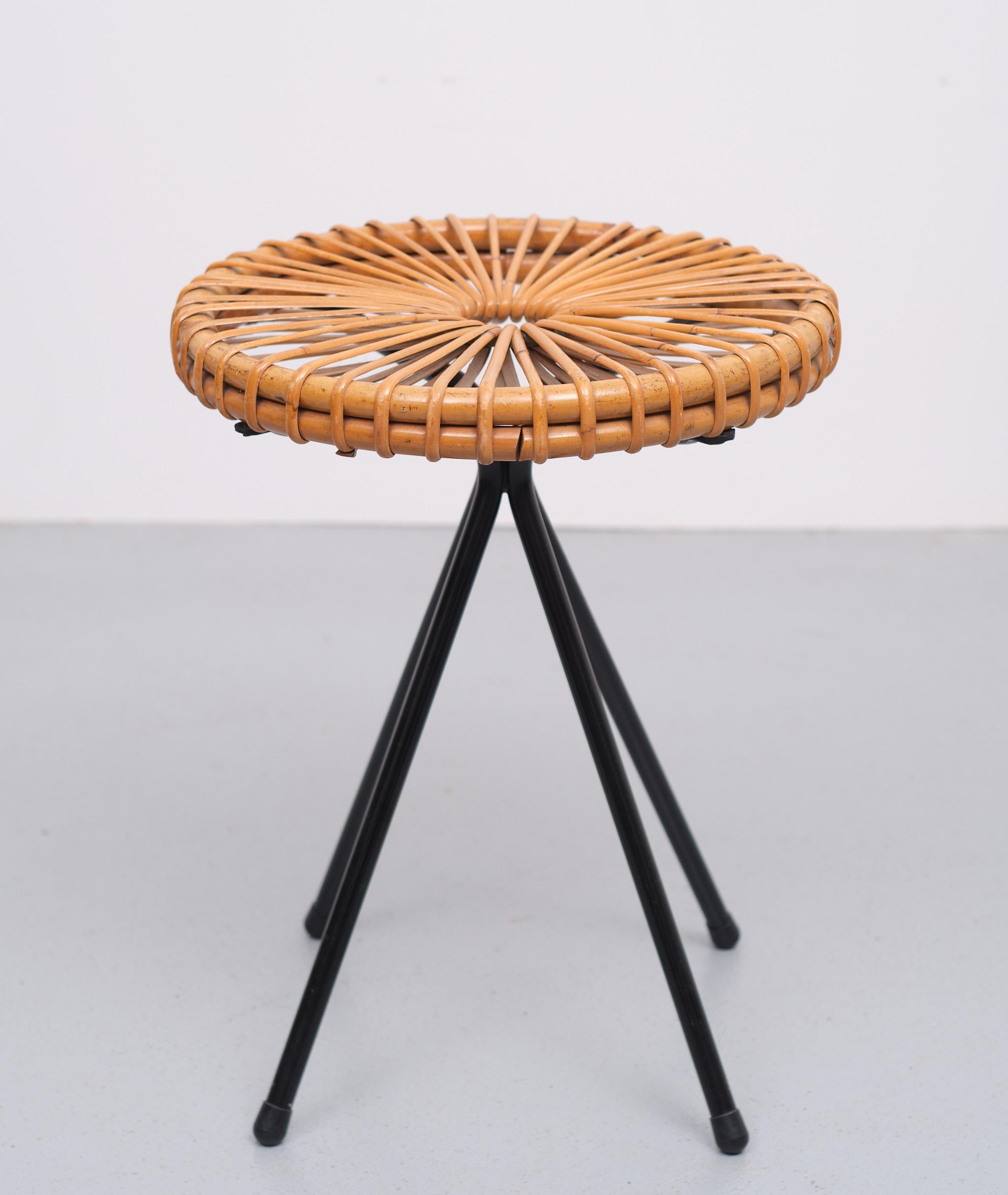 Very nice stool, Manufactured by Rohe Noordwolde Holland 1950s 
Four Metal legs, comes with a Wicker seat. Good condition. 
Great looking piece.