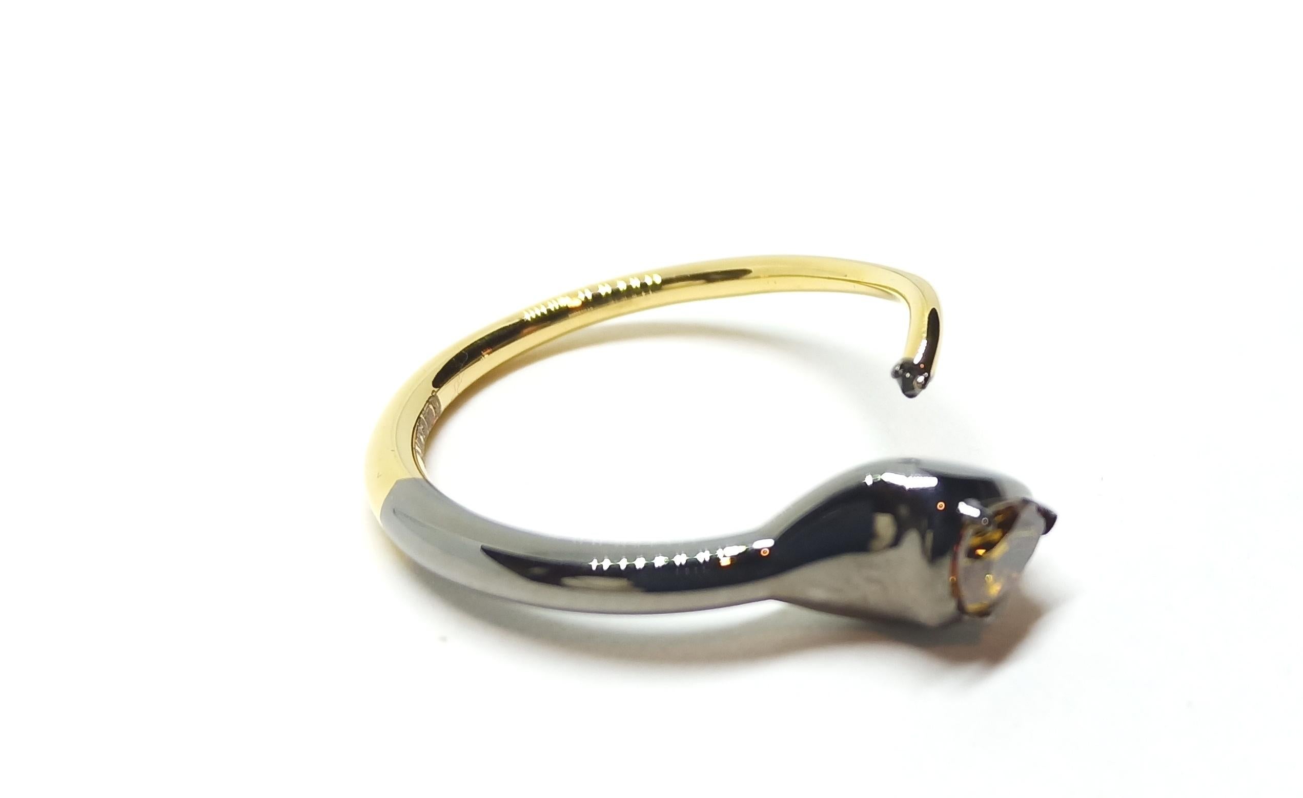 Pear Cut Contemporary One of a Kind Yellow And Black Diamond 18 Karat Gold Ring For Sale