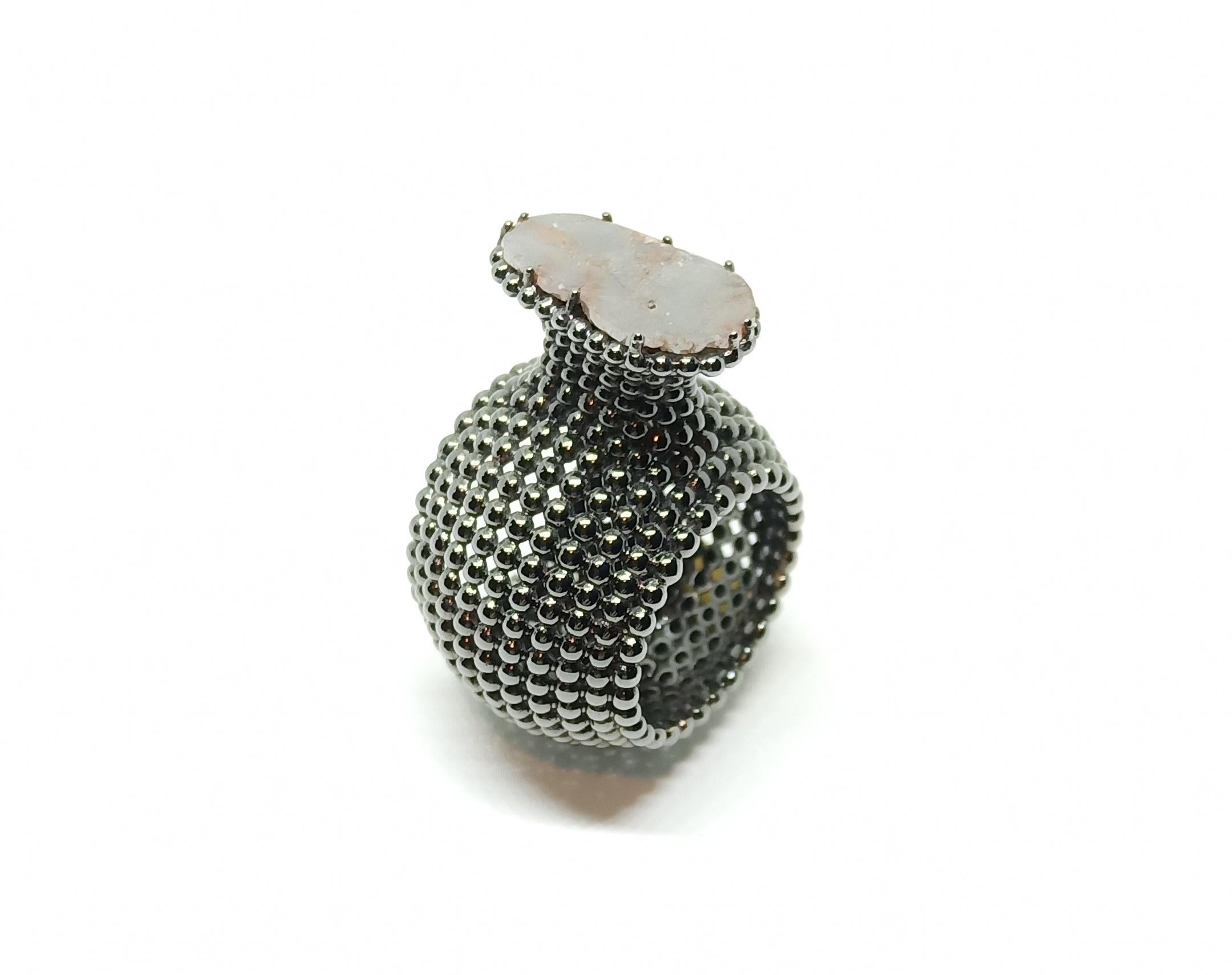 Rohit takes the level of creativity in this One Of A Kind Band to an altogether new level. A fancy colored Grey Diamond slice is perched on top of Black Gold contemporary band with balls conjoined together to form this unique work of Art.  
Rohit is
