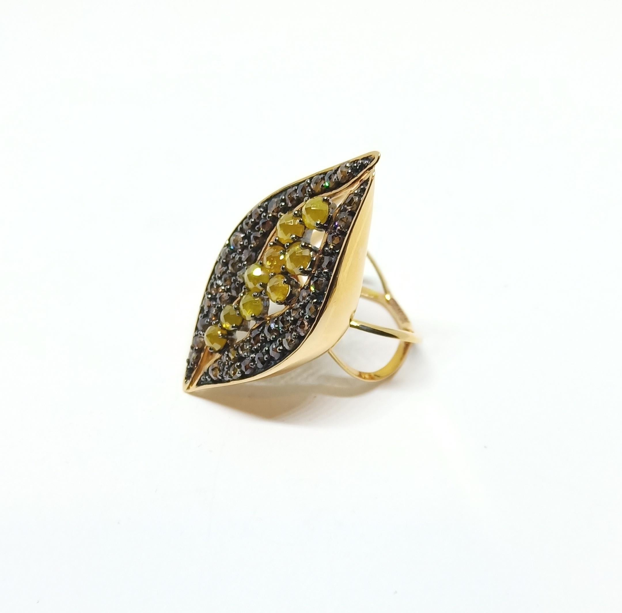 Rohit loves to do things his way, Differently. A simple Boat shaped Ring executed with immense detailing, featuring Fancy Colored Orange Yellow & Dark Brown Rose cut Diamonds. Be it the unique shaped dual band or the way in which the Yellow Rosecut
