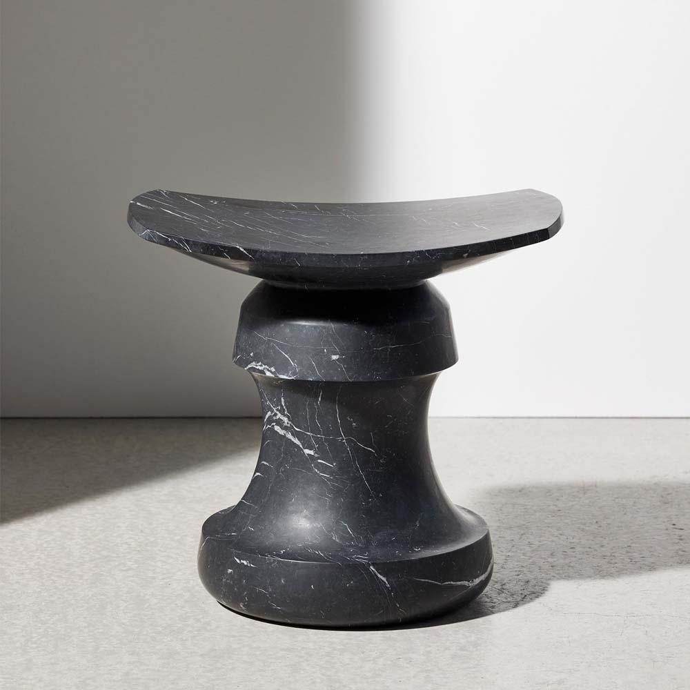 Discover this iconic Roi stool drawn and crafted by the talented French designer Christophe Delcourt for Collection Particulière. Available in solid material such as black marquina marble, this seat represents a life-time piece that will add