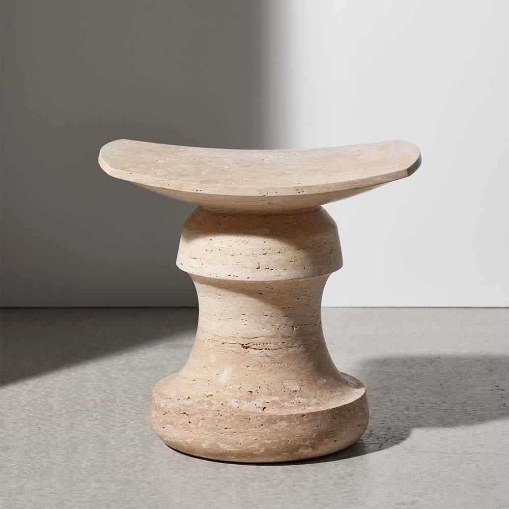 Discover this iconic Roi stool drawn and crafted by the talented French designer Christophe Delcourt for Collection Particulière. Available in solid material such as travertine, this seat represents a life-time piece that will add elegance and