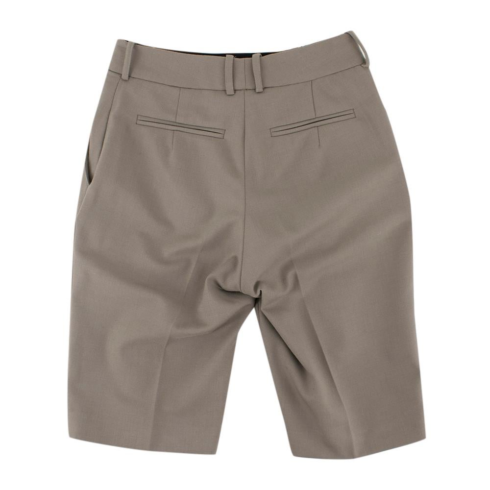 Rokh Wool blend Grey Shorts

- grey wool blend shorts
- medim waist
- unlined
- hidden button, hook and zip fastening
- slip pockets
- belt hoops

Please note, these items are pre-owned and may show some signs of storage, even when unworn and