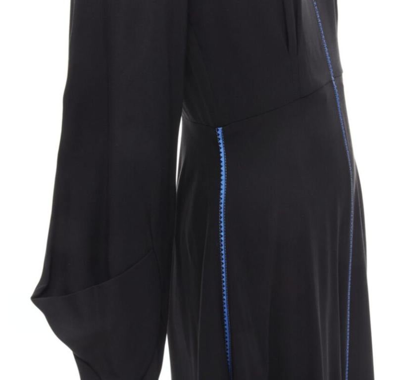 ROKSANDA vestido midi de seda negra azul con detalle de costura y puño acampanado
Referencia: JACG/A00030
Marca: Roksanda
Material: Seda
Color: Negro, Azul
Patrón: Sólido
Cierre: cremallera
Detalles adicionales: Doble busto oscuro. Puño