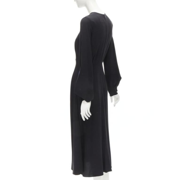 ROKSANDA vestido midi de seda negra azul con detalle de costura y puño acampanado en venta 1