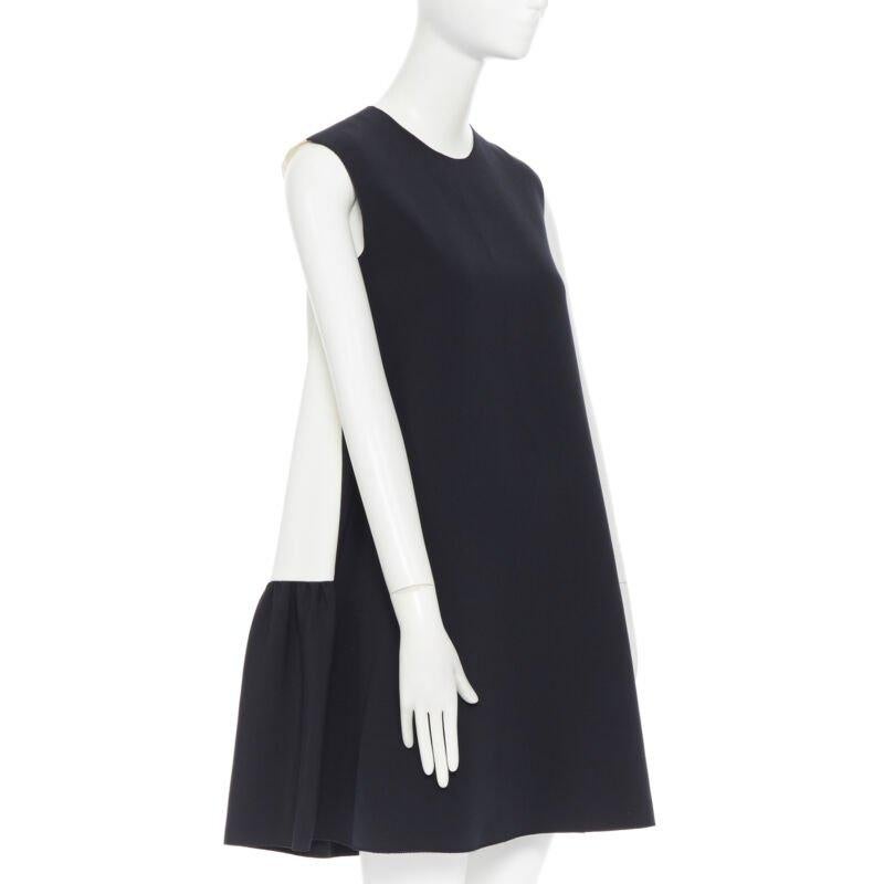 ROKSANDA black sleeveless contrast white back panel pleated skirt boxy dress UK6
Reference: LNKO/A01311
Brand: Roksanda
Model: Cocktail dress
Material: Polyester, Blend
Color: Black, White
Pattern: Solid
Closure: Button
Extra Details: Keyhole