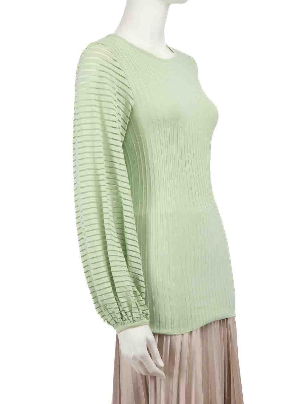 CONDITION is Very good. Minimal wear to top is evident. Minimal wear with the size label having become detached and the composition label is missing on this used Roksanda designer resale item.
 
 Details
 Green
 Synthetic
 Long sleeves top
