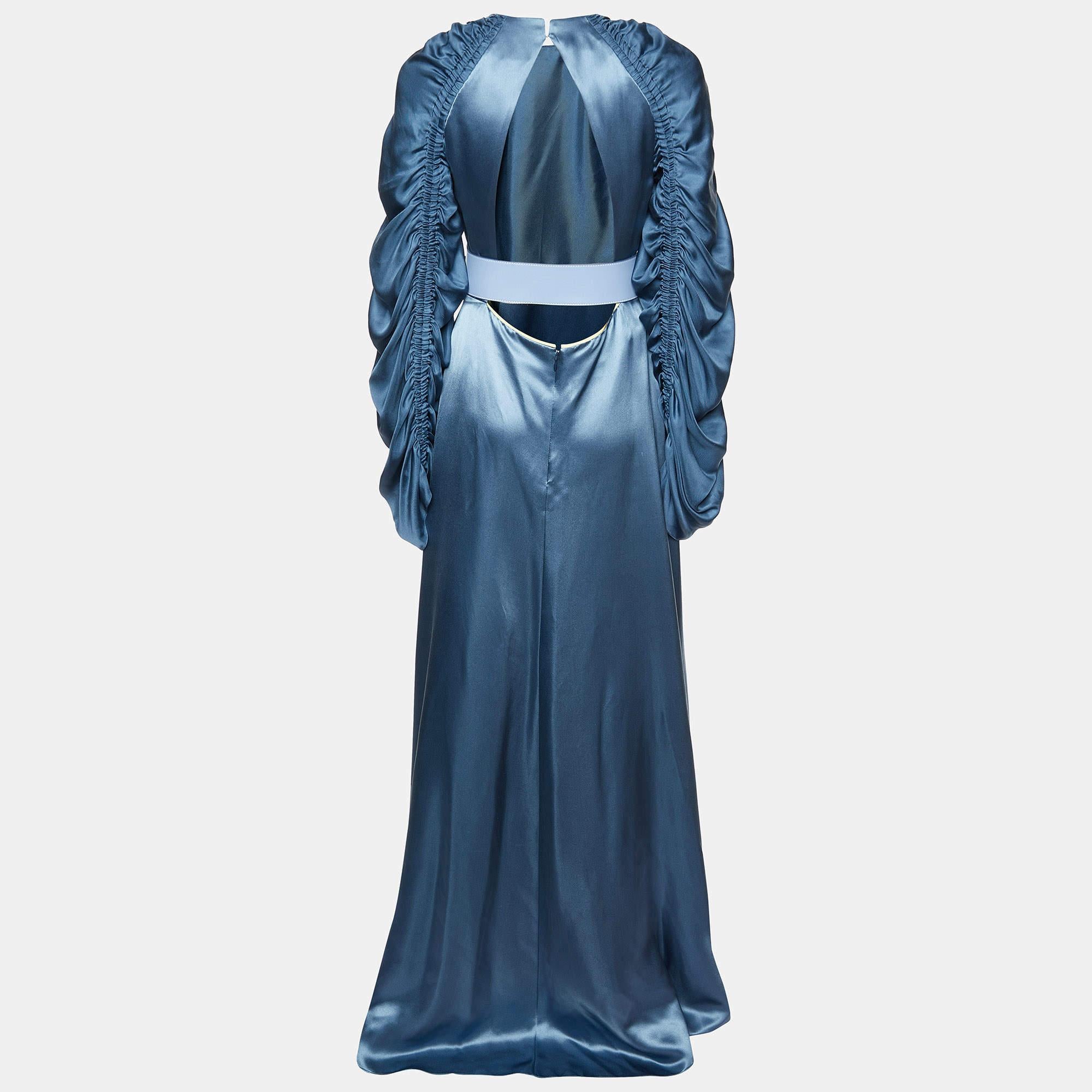 Resplendent elegant and gorgeous this gown defines it all. Flaunting a floor length silhouette this gown is beautified using stunning details and a stylish neckline. Wear it with statement accessories and a defining clutch.