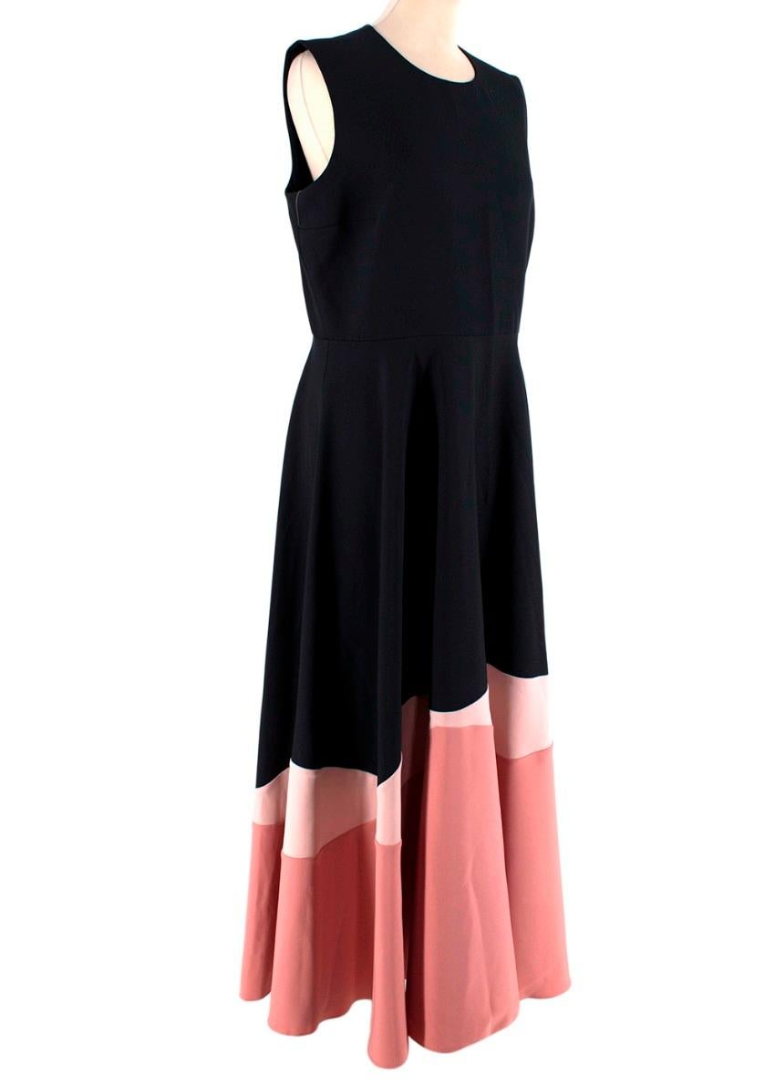  Roksanda Navy & Pink Colour Block Sleeveless Dress
 

 - Sleeveless, round neck navy crepe dress with bicolour pink colour block hemline
 - Maxi length with volume through the skirt
 - Concealed back zip, partially lined 
 

 Materials:
 97%