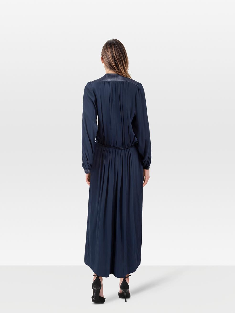 CONDITION is Very good. Minimal wear to dress is evident. Minimal wear to both armpits where some discolouration can be seen on this used Roksanda designer resale item.
 
 Details
 
 
 Navy
 
 Wool
 
 Dress
 
 Midi
 
 V neck
 
 Long sleeves
 
