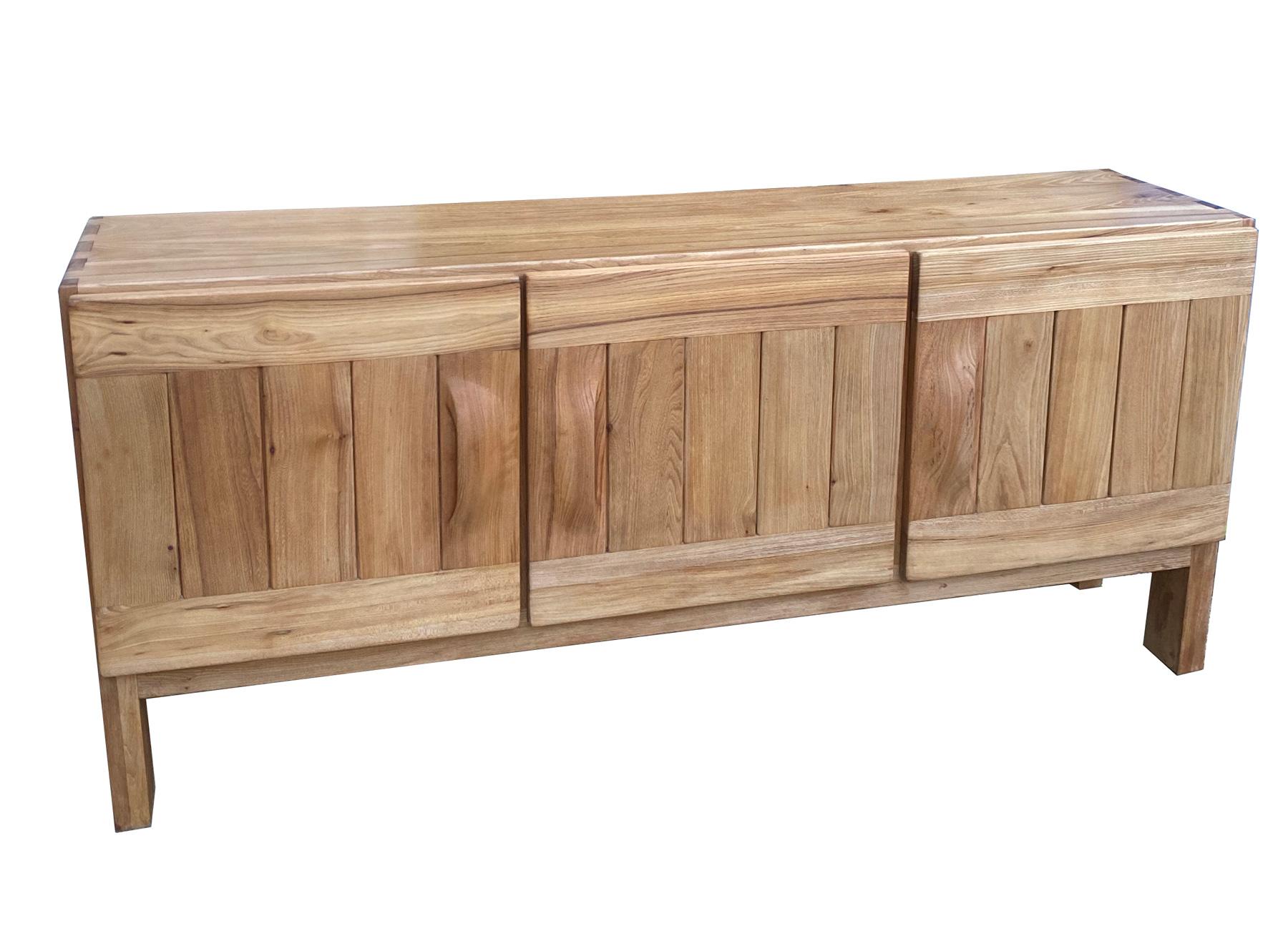 Roland Haeusler, Maison Regain Brutalist sideboard elm
Maison regain was a manufacturer of furniture in France during the 1960s, 1970s and 1980s, mostly involved in the production of elm furniture. Maison regain originated in the Haute-Alpes region