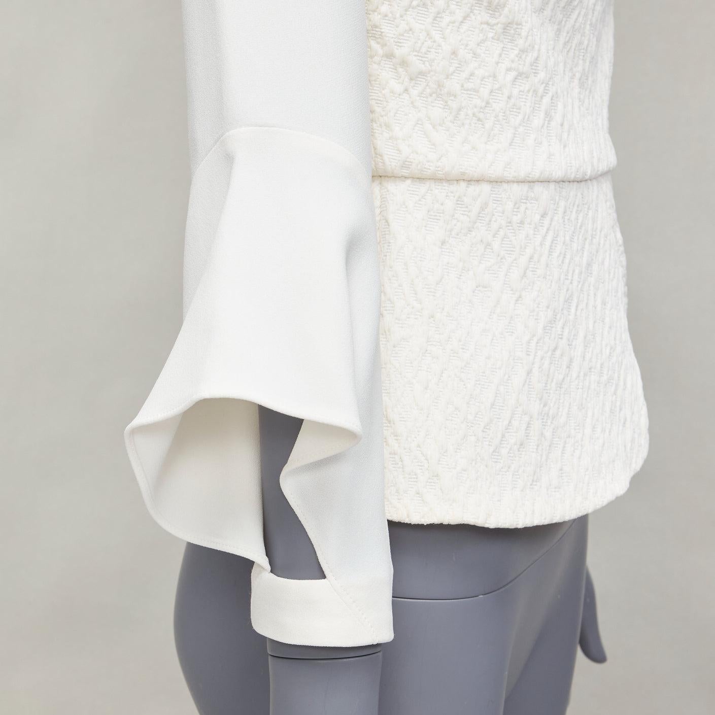 ROLAND MOURET 2018 Richardson cream textured crepe ruffle cuff peplum top UK6 XS
Reference: AAWC/A01144
Brand: Roland Mouret
Model: RIchardson
Collection: 2018
Material: Polyamide, Blend
Color: Cream
Pattern: Solid
Closure: Zip
Made in: