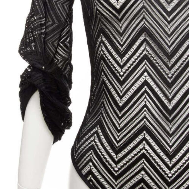 ROLAND MOURET black chevron lattice lace draped charm sleeves bodysuit top XS
Reference: AAWC/A00811
Brand: Roland Mouret
Material: Viscose, Blend
Color: Black
Pattern: Lace
Closure: Keyhole Button
Lining: Black Fabric
Extra Details: Keyhole back.