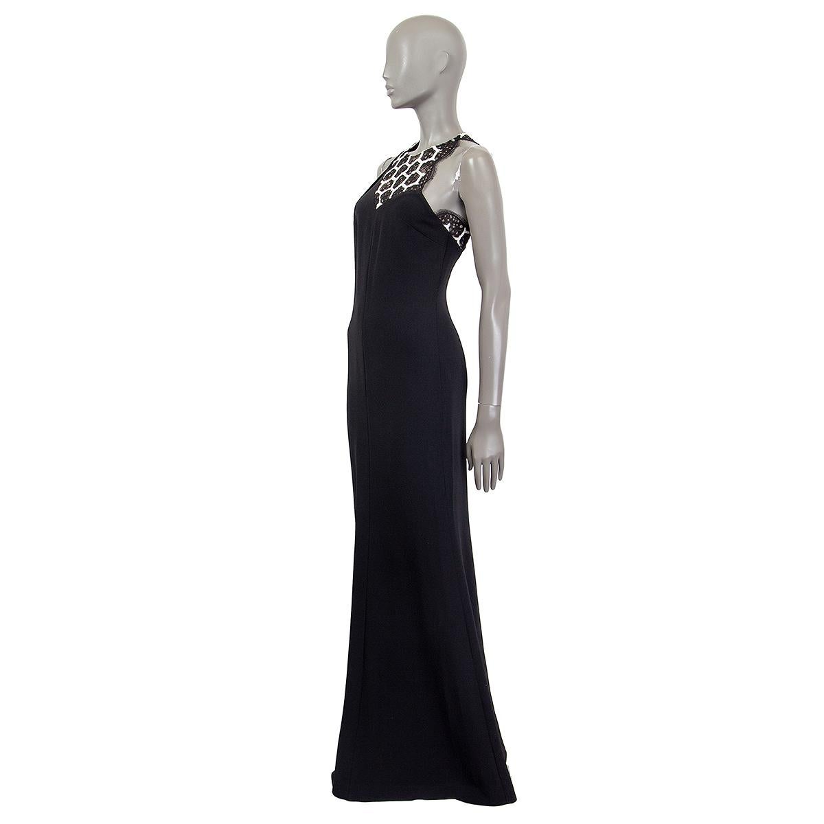 100% authentic Roland Mouret sleeveless maxi dress in black viscose (36%), acetate (35%), nylon (26%) and elastane (3%) with embroidered lace panel in black and white. Opens with a zipper in the back. Lined in acetate (68%) and polyerster (32%). Has