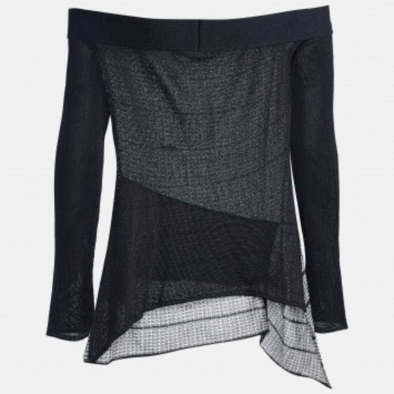 Questo top di Roland Mouret è impreziosito da due diversi design su entrambi i lati. Realizzata in tessuto a maglia, presenta una parte anteriore con dettagli in bianco e nero e un orlo ben disegnato. Il modello off-shoulder e le maniche lunghe