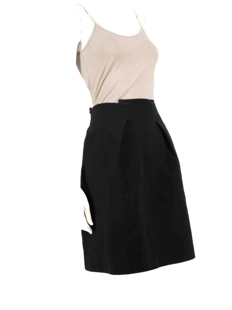 CONDITION is Very good. Hardly any visible wear to skirt is evident on this used Roland Mouret designer resale item.
 
 
 
 Details
 
 
 Black
 
 Wool
 
 Fitted skirt
 
 Knee length
 
 Gathered accent on waist
 
 2x Front side pockets
 
 Back full