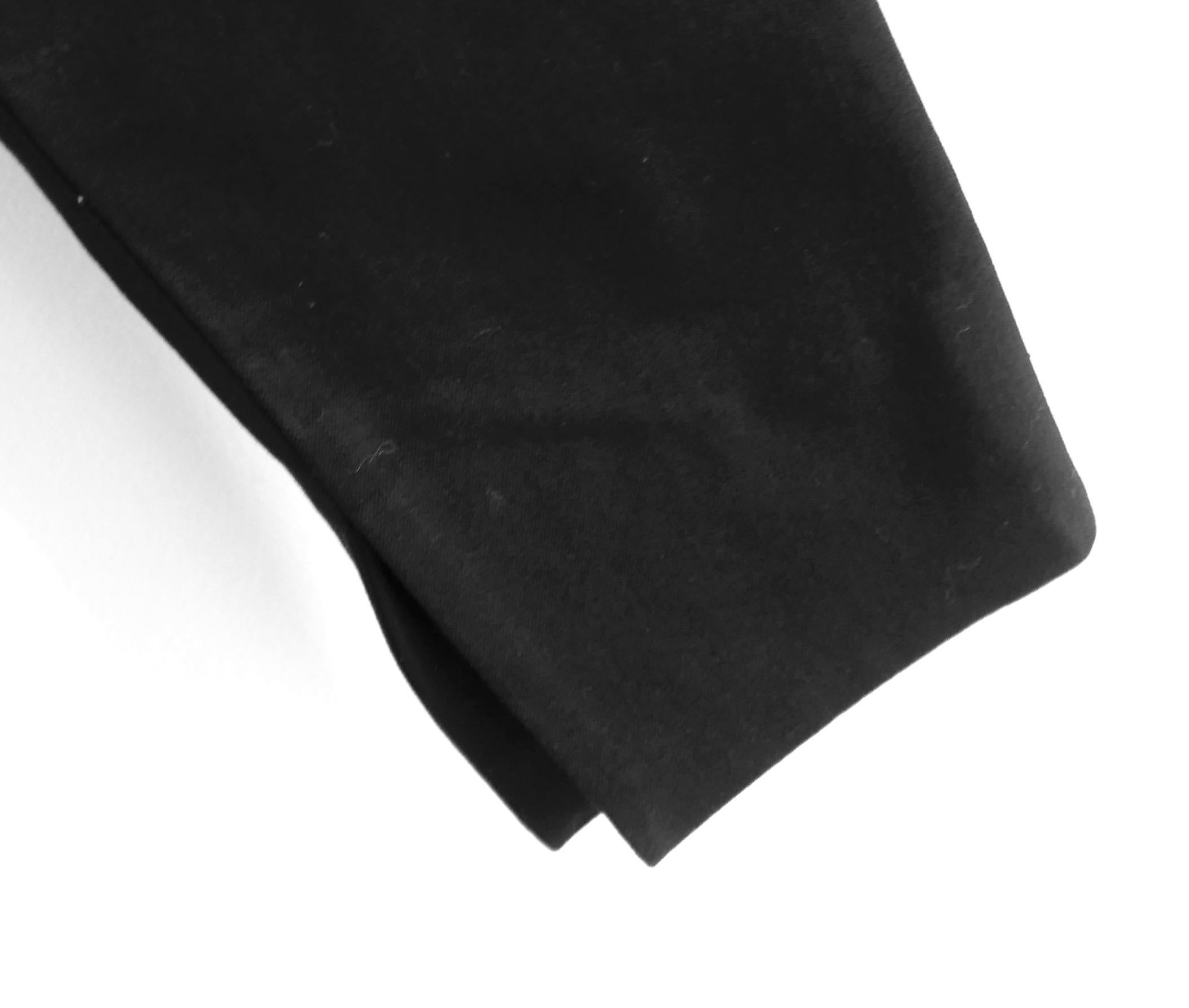 Super sleek Roland Mouret zip side trousers - bought for £575 and new with tags. Made from black cotton/elastane mix gaberdine, they have a leg lengthening, slim fit with vent on the inner ankle seam to allow the trouser to rest just below the
