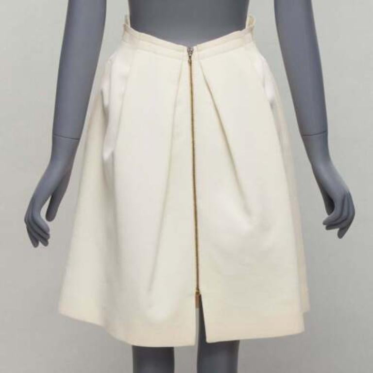 ROLAND MOURET cream wool crepe silk trim origami fold pleat waist skirt UK6 XS
Reference: SNKO/A00304
Brand: Roland Mouret
Material: Wool, Silk
Color: Cream
Pattern: Solid
Closure: Zip
Lining: Cream Fabric
Extra Details: Zip back detail.
Made in: