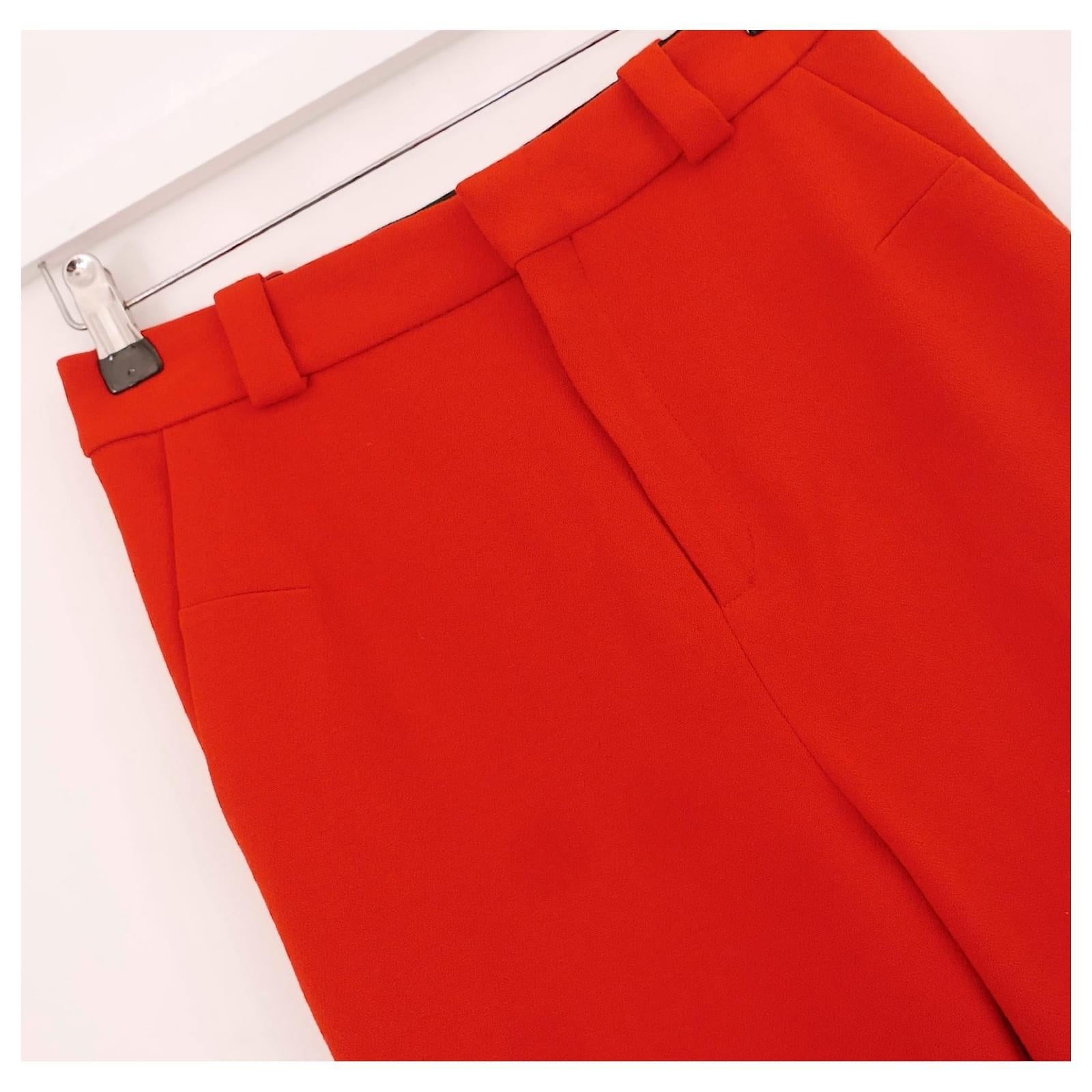 Super festive Roland Mouret Dilman pants - bought for $795 and new with tags. Made from Poppy Red structured polyester/viscose crepe, they have a high waisteded, flared cropped legs with slits to hem and feature stitching to front. Size UK6/FR34.