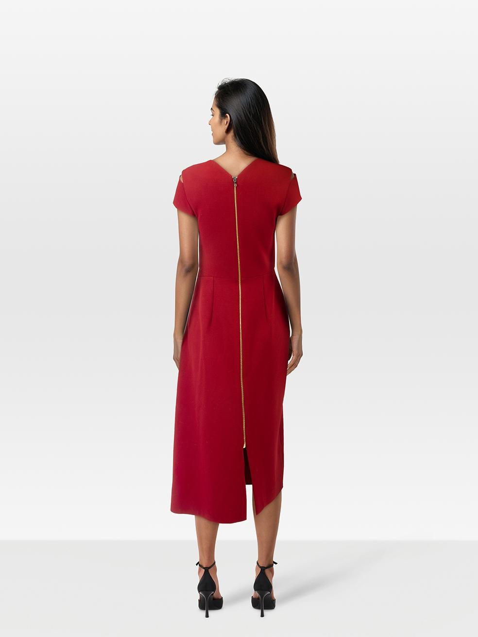 CONDITION is Very good. Minimal wear to the dress is evident. Mark on the lower back left above the hem. Plucks to the weave on the upper front, front left drape and lower back on this used Roland Mouret designer resale item. Mark may need gentle