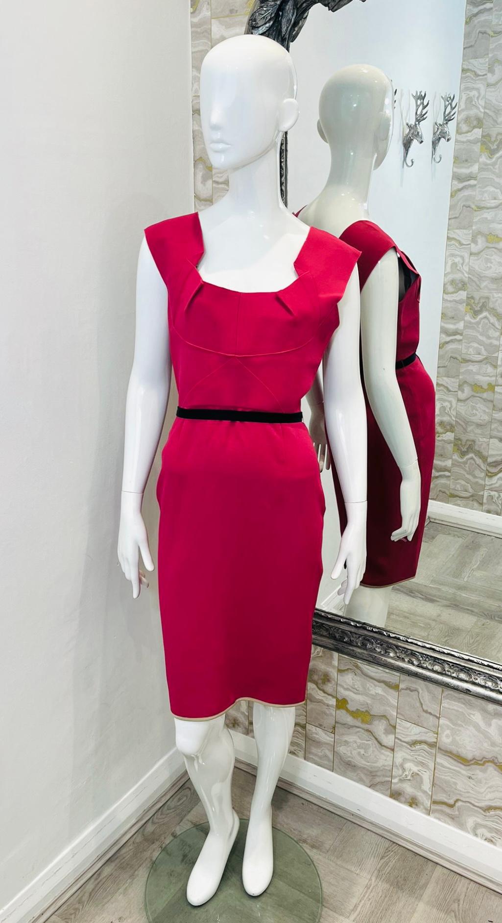 Limited Edition - Roland Mouret For Selfridges Pencil Dress

Fuchsia midi sleeveless dress designed with pleat detailed square neckline.

Featuring deep V-Neck to rear, black self-tie belted waist and zip fastening to the back.

Size –