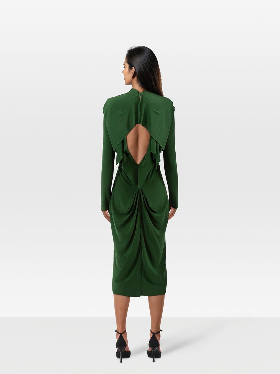 CONDITION is Very good. Minimal wear to dress is evident. Minimal wear to the inside upper back left where some slight discolouration can be seen on this used Roland Mouret designer resale item.
 
 Details
 
 
 Green¬†
 
 Viscose¬†
 
 Dress
 
