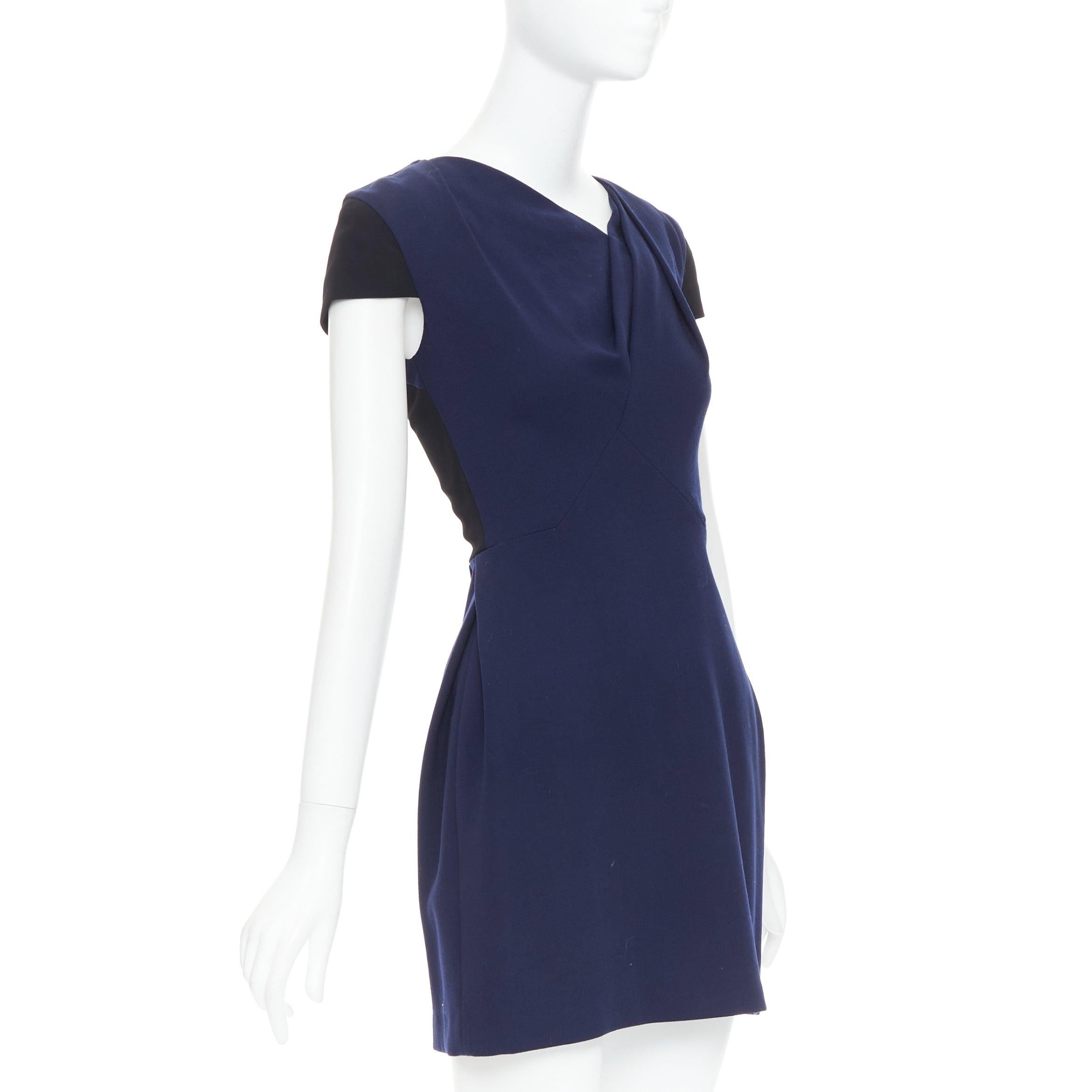 Nero ROLAND Mouret abito a turni asimmetrico con maniche a cappuccio in misto lana blu navy UK6 XS in vendita