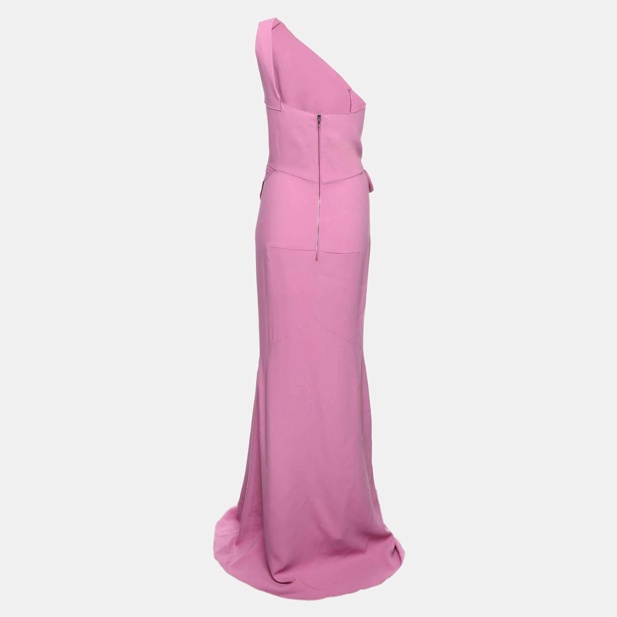 The fine artistry and the feminine silhouette of this Roland Mouret pink evening dress exhibit the labels impeccable craftsmanship in tailoring. It is stitched using quality materials and can be easily styled with sparkling jewelry heels and your