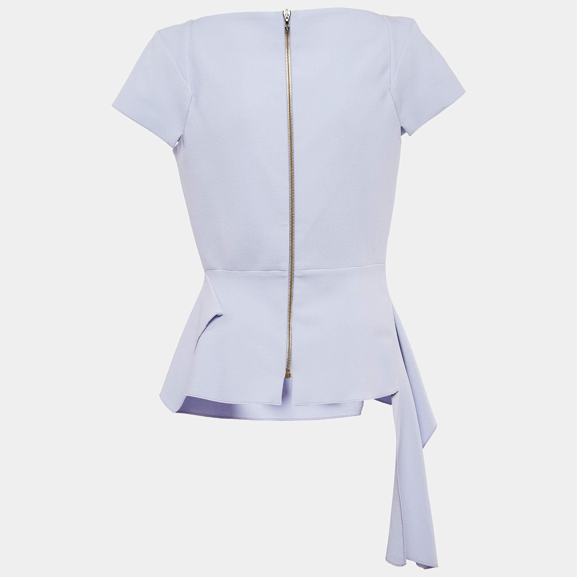 Find great style and comfort while wearing this designer top. Tailored using the best fabric, the creation has been given immense detail. Style it with a skirt and heels.