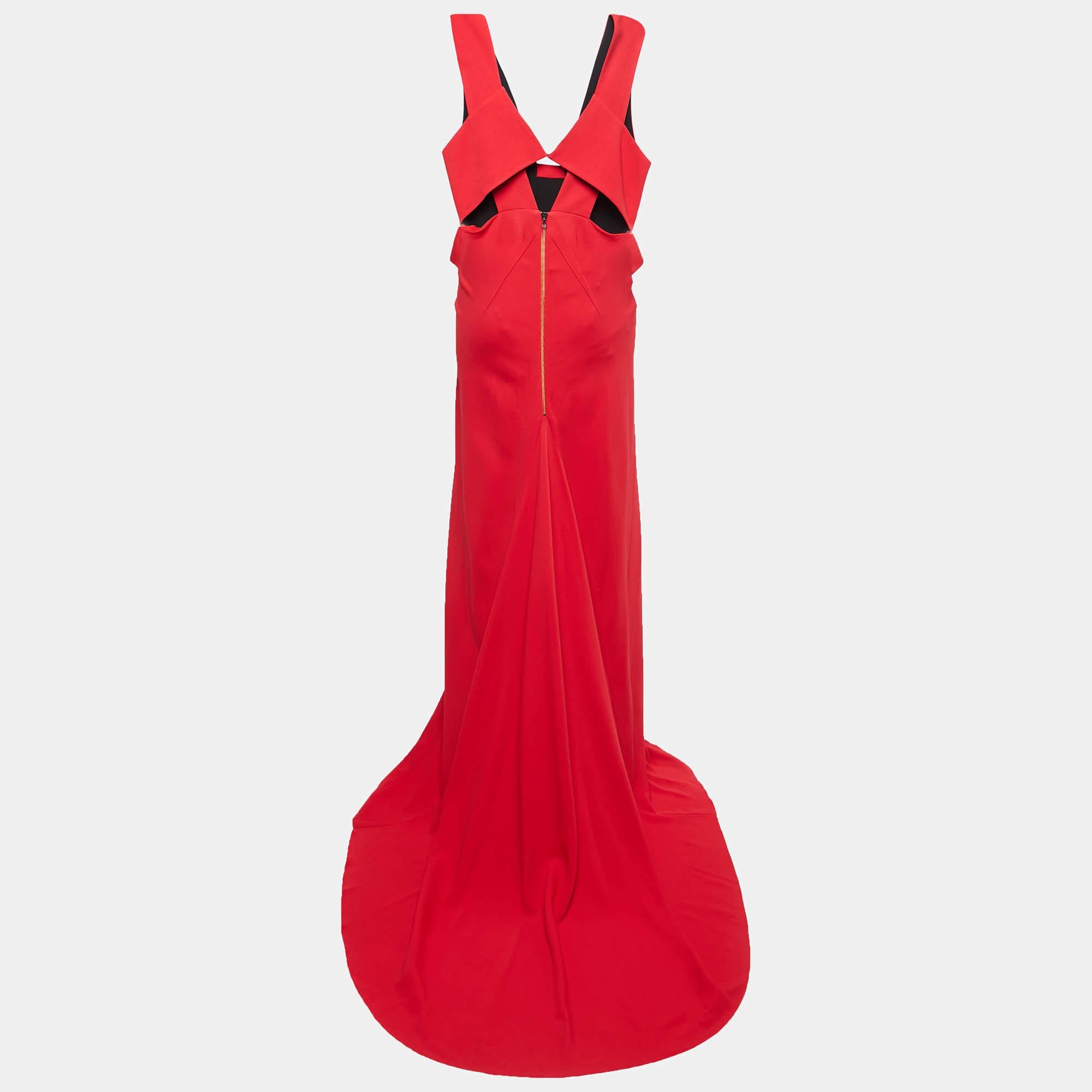 Make a statement in the Roland Mouret Lubelia gown crafted from luxurious red crepe. This striking design features a flattering flared silhouette with subtle pleats and a fitted bodice that gracefully contours the figure. The gown's elegant drape