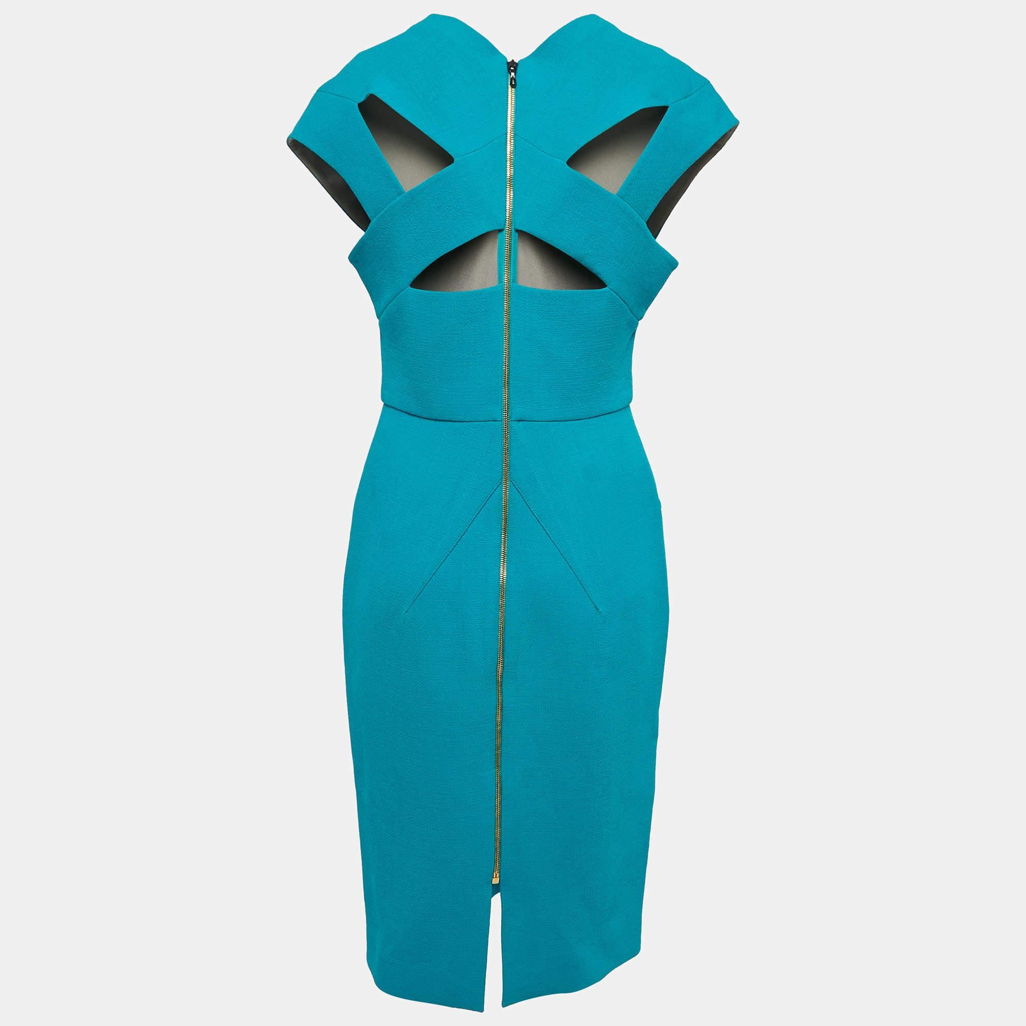 The Roland Mouret Egerton dress is an exquisite piece that combines elegance and sophistication. Crafted from luxurious wool crepe, it features a flattering V-neckline and a timeless sheath silhouette, making it a perfect choice for special