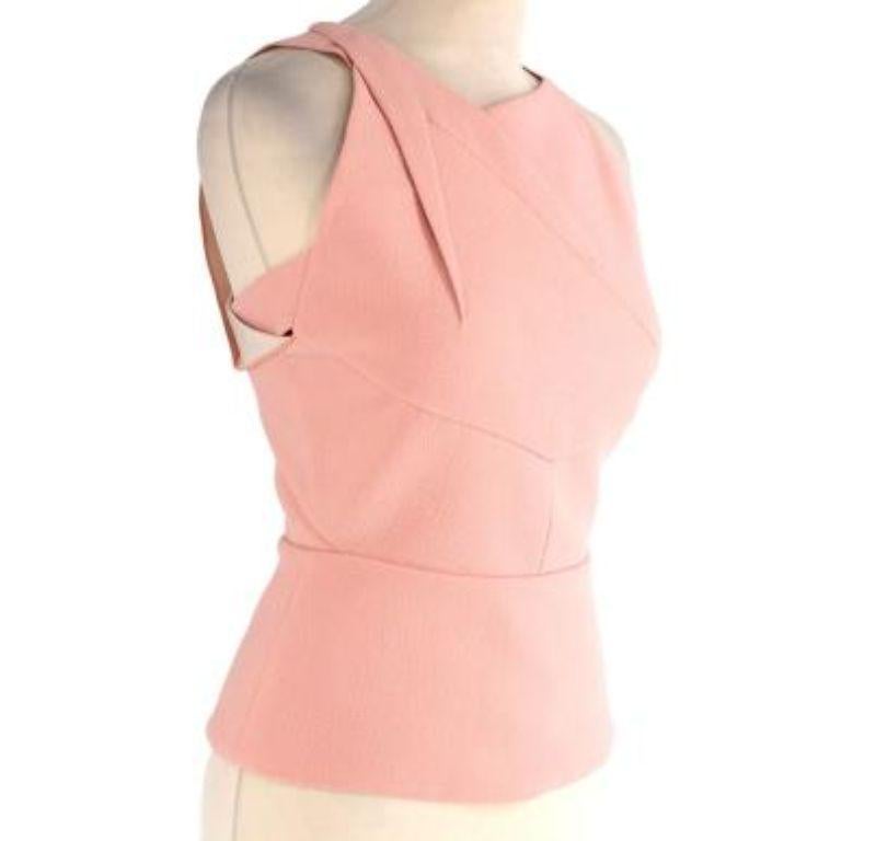 Roland Mouret Shell pink wool crepe top

- Fitted woollen top with contemporary neckline and cut-outs
- Exposed back zip
- Tonal stitching 
- Silk lined 

Materials 
100% Wool 

Made in the USA 
Dry clean only 

9.5/10 excellent condition with no