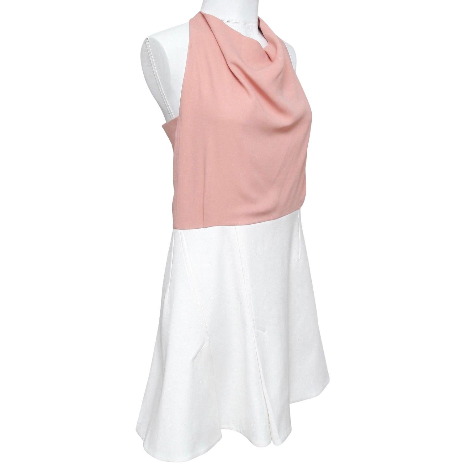 GUARANTEED AUTHENTIC ROLAND MOURET 2016 PAGET COWL NECK SLEEVELESS DRESS

Retail excluding taxes $1,230


Design:
- White and pale pink cowl neck sleeveless style dress.
- Cut-out upper back, exposed zipper closure.
- Lined.

Material:
- 60% Cotton,