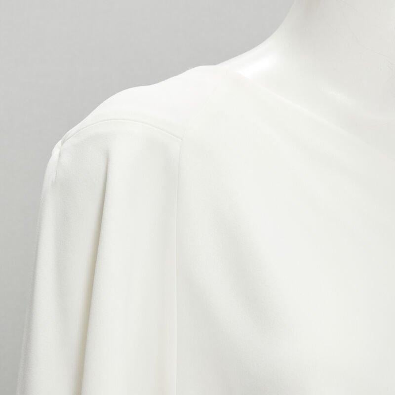 ROLAND MOURET white viscose crepe draped one shoulder cascade top UK10 M
Reference: KNLM/A00234
Brand: Roland Mouret
Material: Viscose, Blend
Color: White
Pattern: Solid
Extra Details: One shoulder. Draped cascade hem.
Made in: United