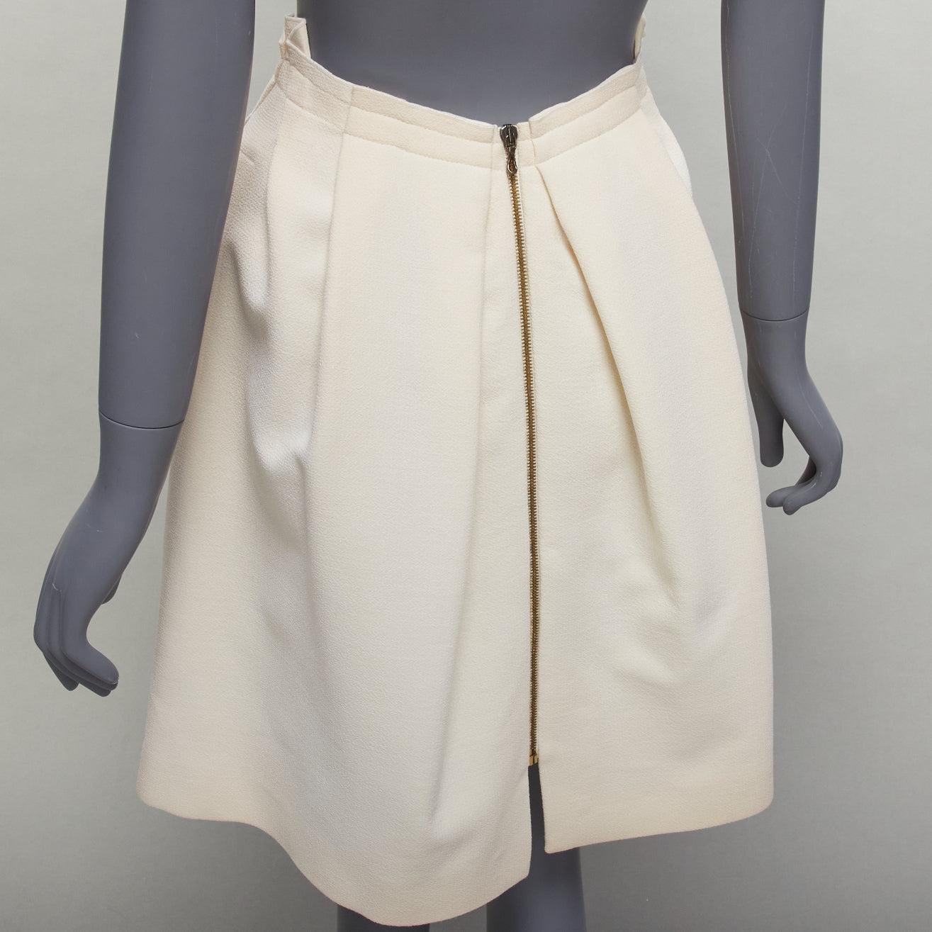 ROLAND MOURET cream wool crepe silk trim origami fold pleat waist A-line skirt UK6 XS
Reference: SNKO/A00304
Brand: Roland Mouret
Material: Wool, Silk
Color: Cream
Pattern: Solid
Closure: Zip
Lining: Cream Fabric
Extra Details: Zip back detail.
Made