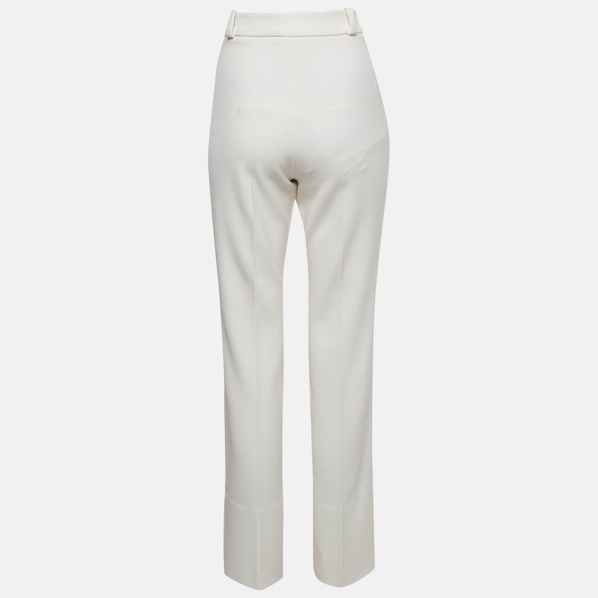 De colección limitada  Este par de pantalones de Roland Mouret X Net a Porter Off White está confeccionado con materiales nobles en una silueta de pernera recta y será un complemento muy a tener en cuenta en tu armario. El cierre abotonado completa