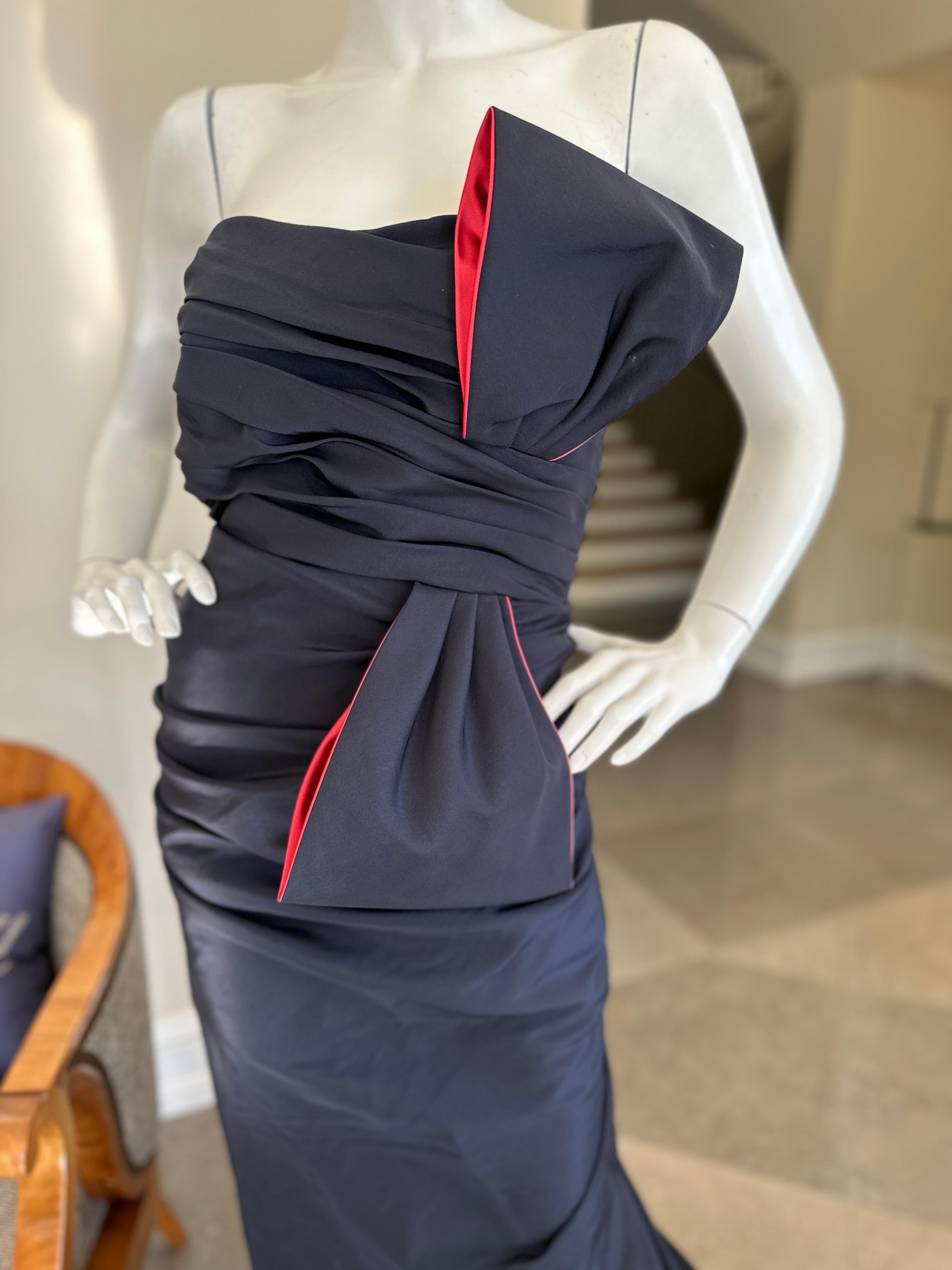  Roland Nivelais Strapless Vintage Silk Evening Dress with Exaggerated Bow & Fishtail Back 
Marked size 8 
Simply stunning, please use the zoom feature to see all the remarkable details.
Bust 36
