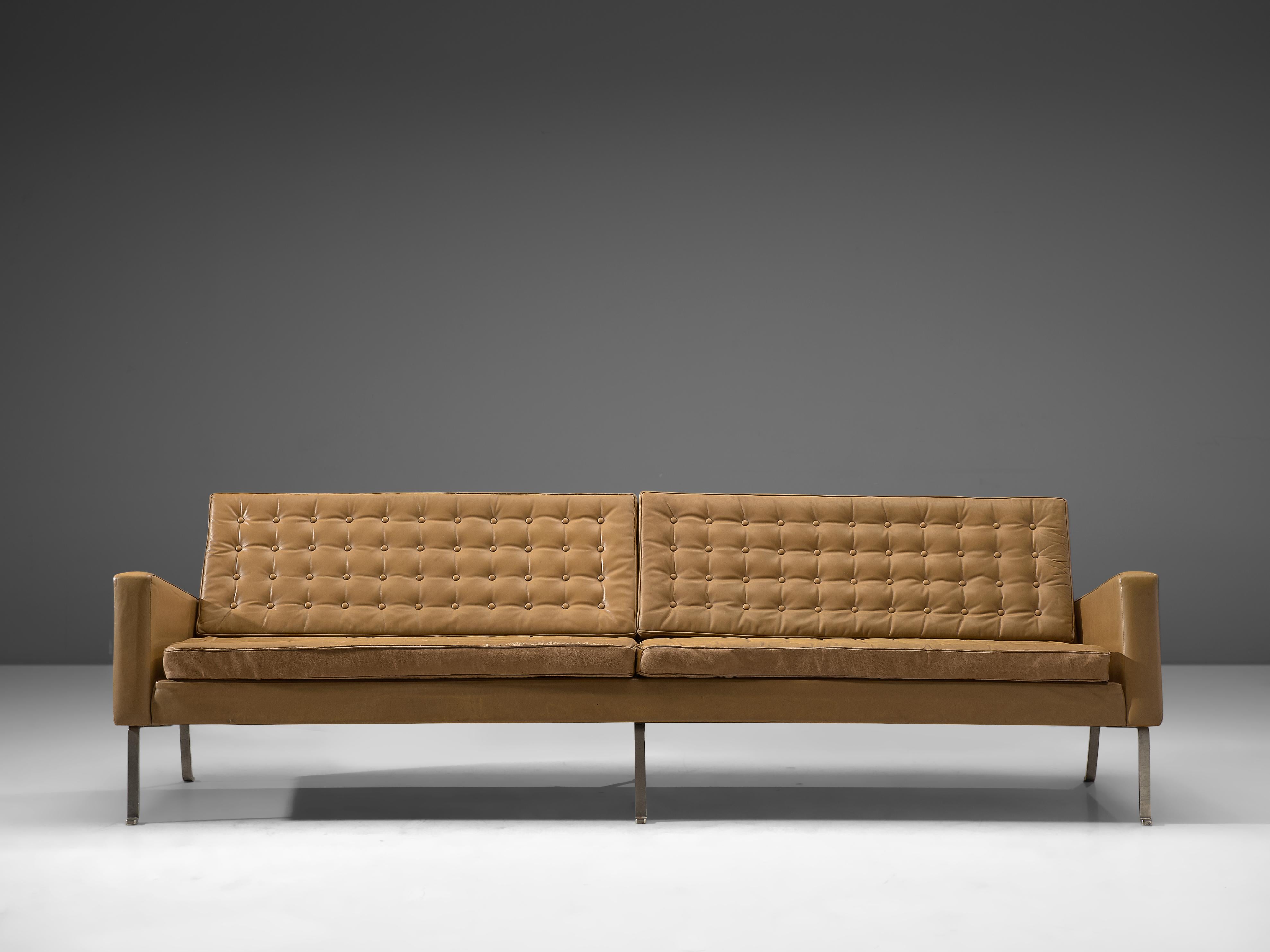 Roland Rainer for Wilkhahn, sofa, leather, Germany, 1960s

Modern four-seat sofa by Roland Rainer. This large sofa features an extraordinary stately design, being both crisp and warm at the same time. The metal frame holds a camel brown leather body