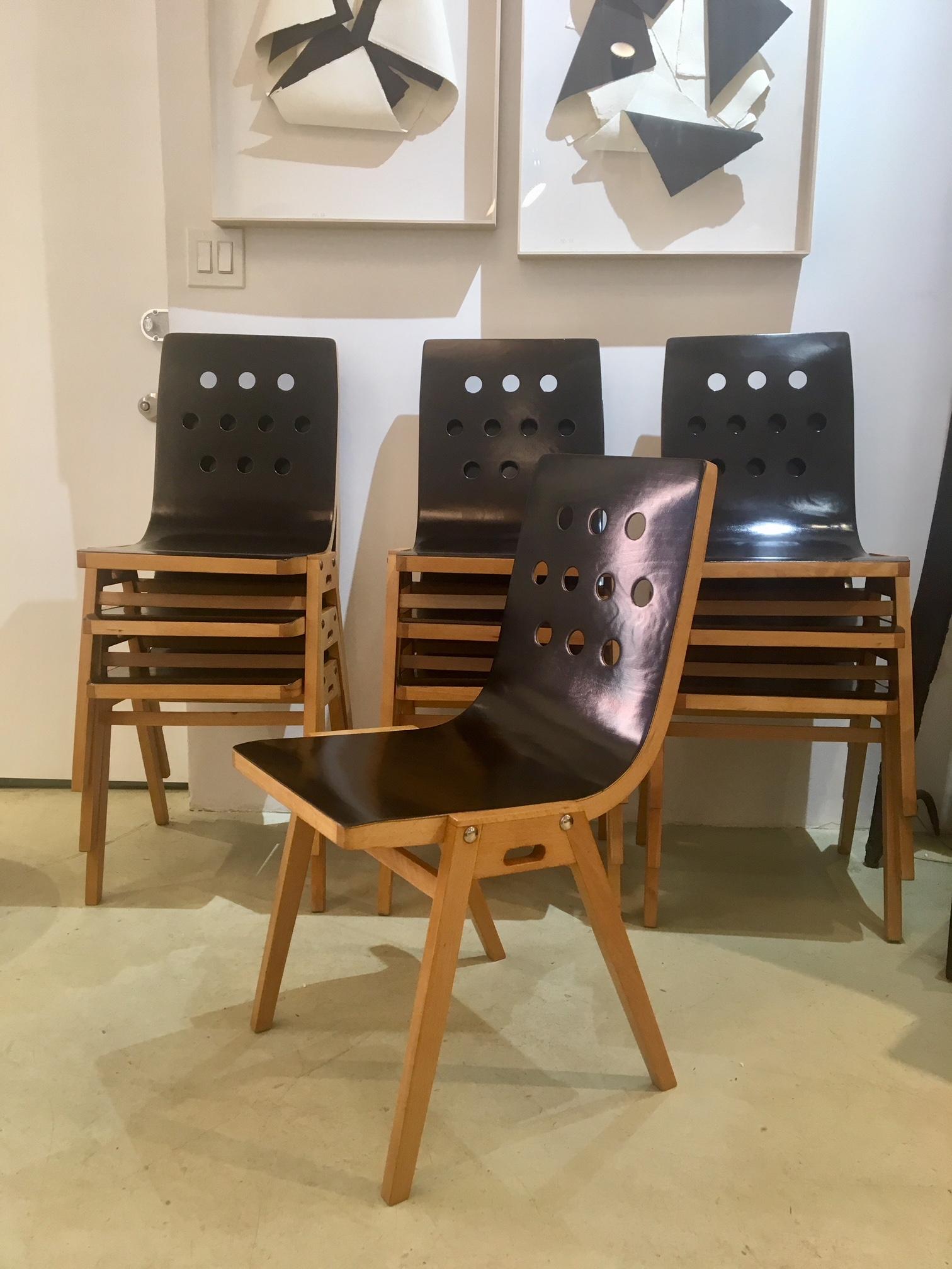 A beautiful set of ten Roland Rainer stackable chairs, created for Vienna Stadthalle, 1951. Chairs are constructed of natural beechwood and lacquered beech plywood. Excellent restored condition.
Please don't hesitate to ask for additional images, or